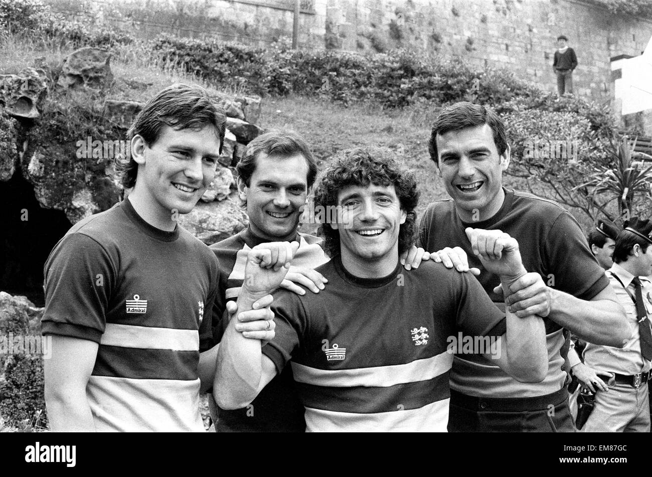 England footballers left to right: Bryan Robson, Ray Wilkins, Kevin Keegan and Trevor Brooking at the team hotel during the 1982 World Cup Finals in Spain. June 1982. Stock Photo
