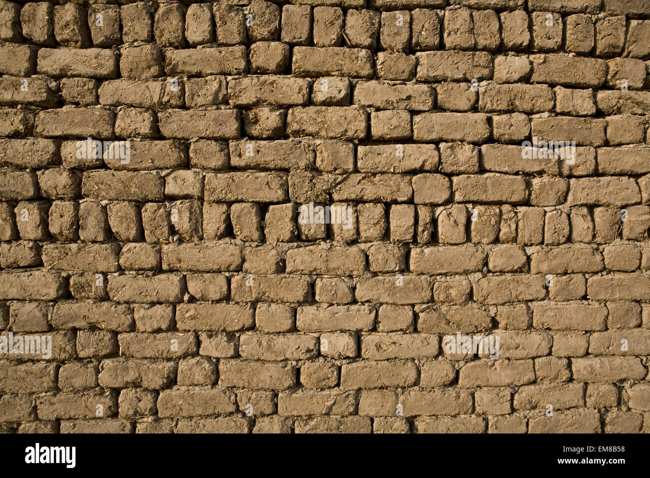 Background of adobe brick wall, close to Luxor temple, Egypt Stock Photo -  Alamy