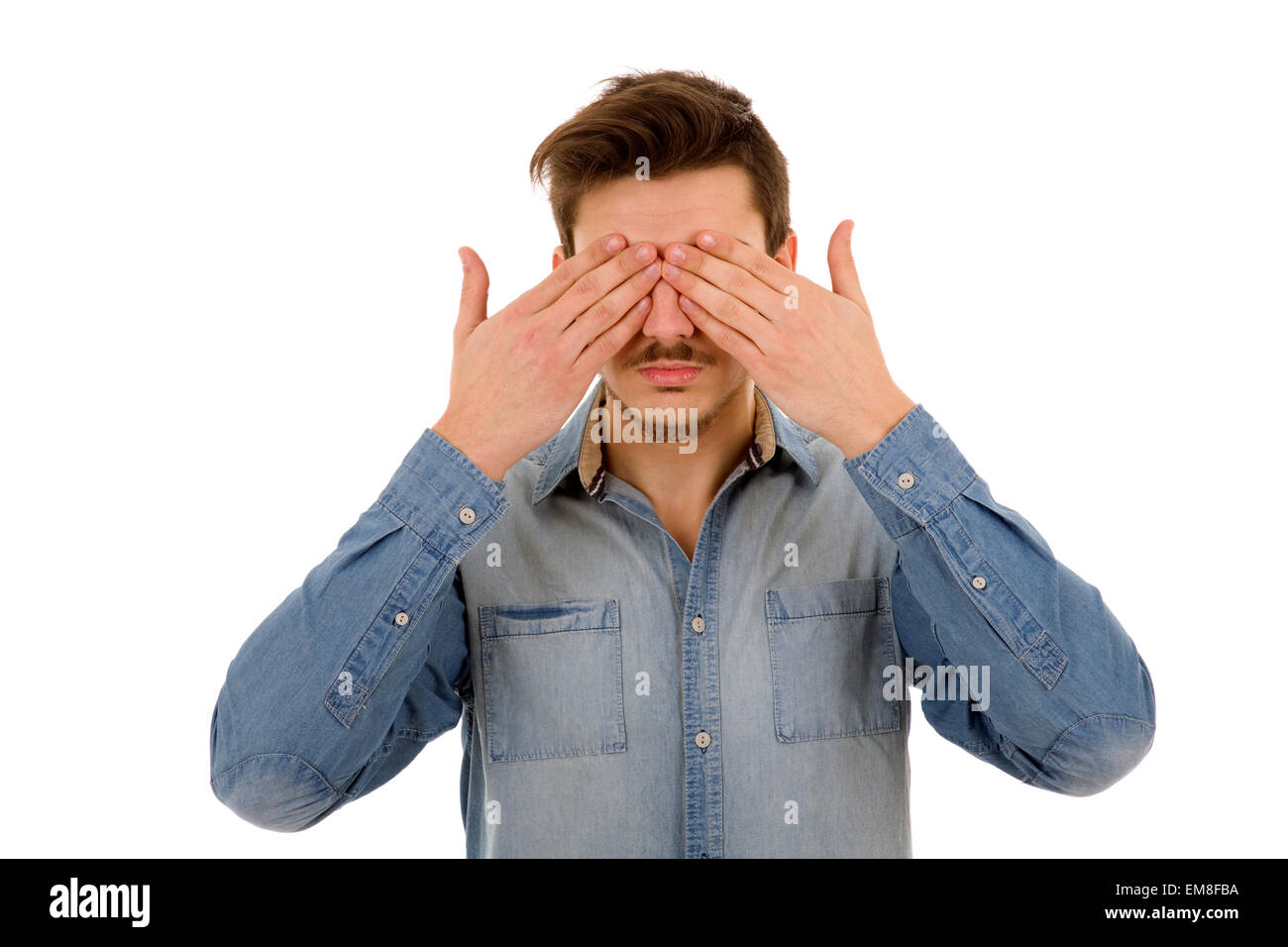 Man covering his face, isolated on white background Stock Photo