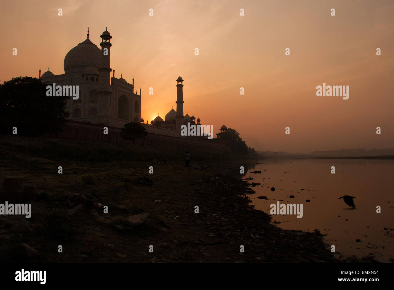 Sunset over the Taj Mahal taken from the Yamuna River in Agra, India Stock Photo