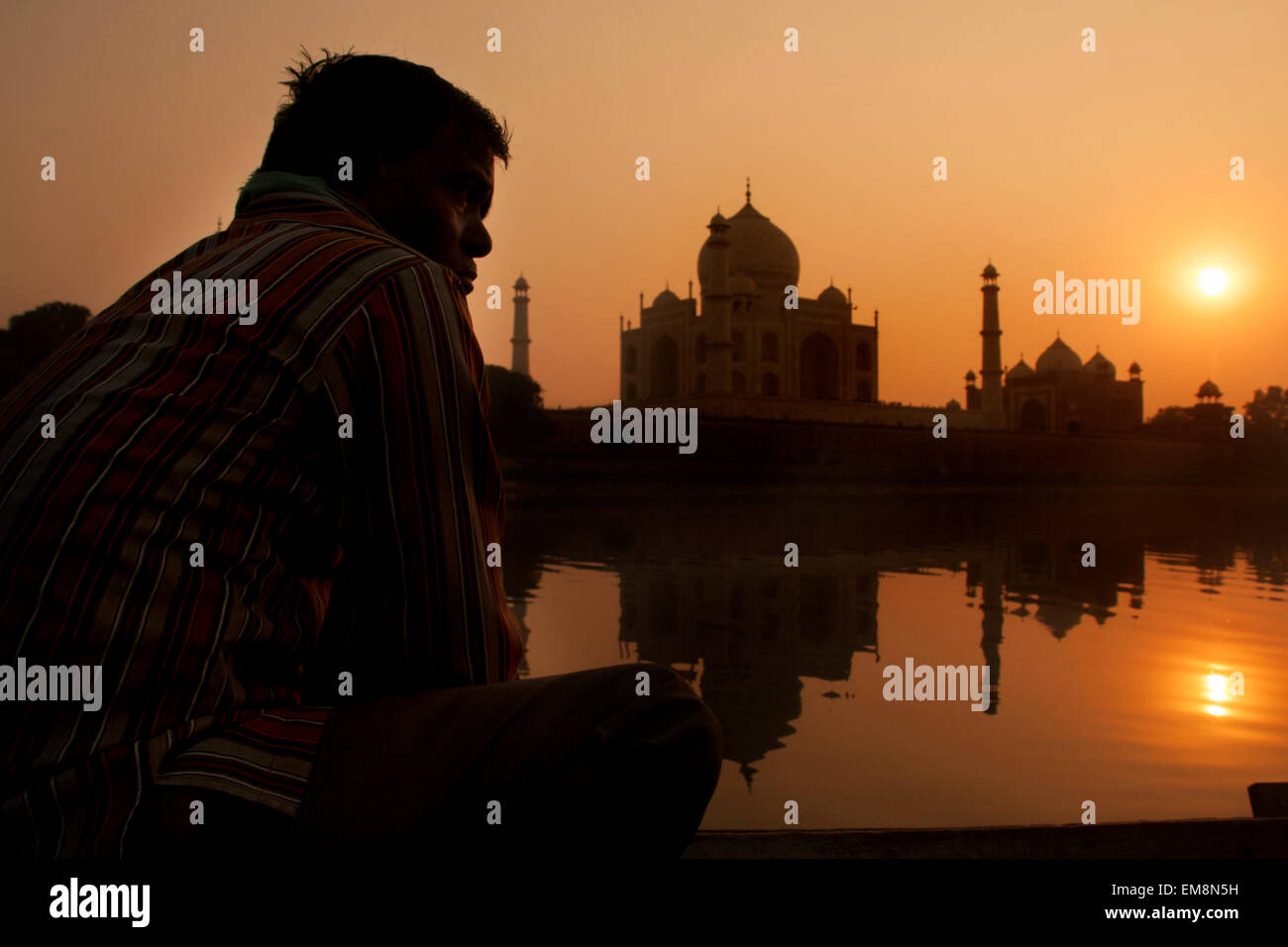 Sunset over the Taj Mahal taken from the Yamuna River in Agra, India Stock Photo