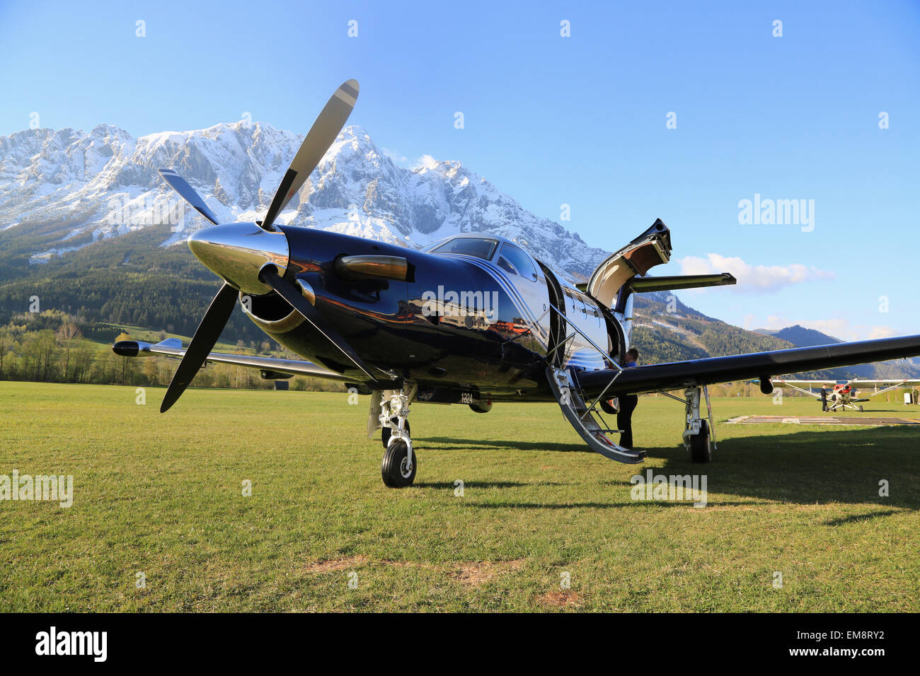 Turboprop aircraft on the ground in Alpen. Stock Photo