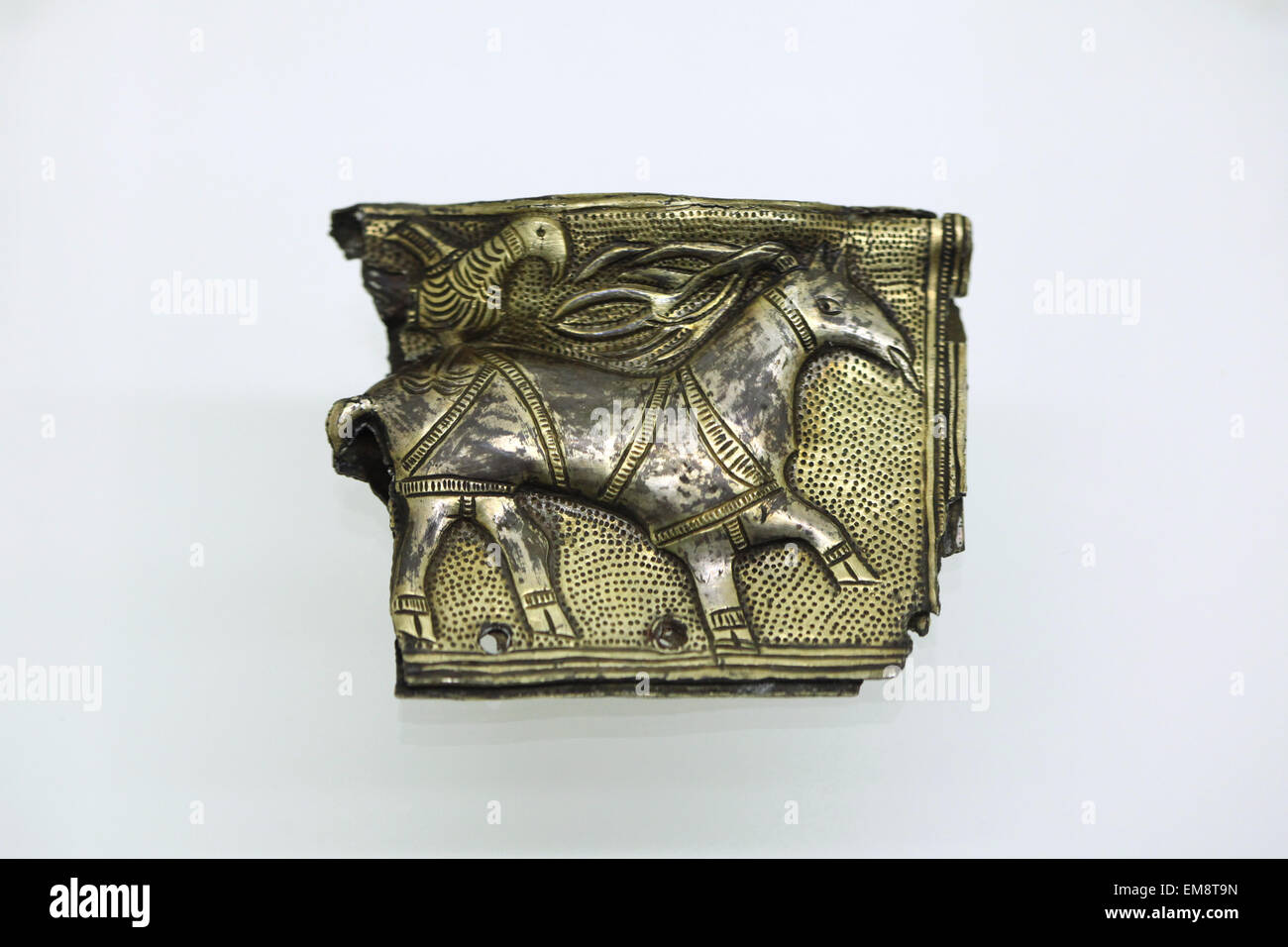 Great Moravian silver gilded kaptorga (early medieval container for amulets) with a picture of a deer and a bird from the Princess grave from Želénky displayed at the exhibition 'Great Moravia and the Beginnings of Christianity' in Prague, Czech Republic. The silver jewellery from the second half of the 9th century was discovered in the so-called Princess grave the village of Želénky, North Bohemia, Czech Republic. The exhibition presenting medieval treasures and original artefacts of the first Slavic state runs in Prague Castle till June 28, 2015. Stock Photo