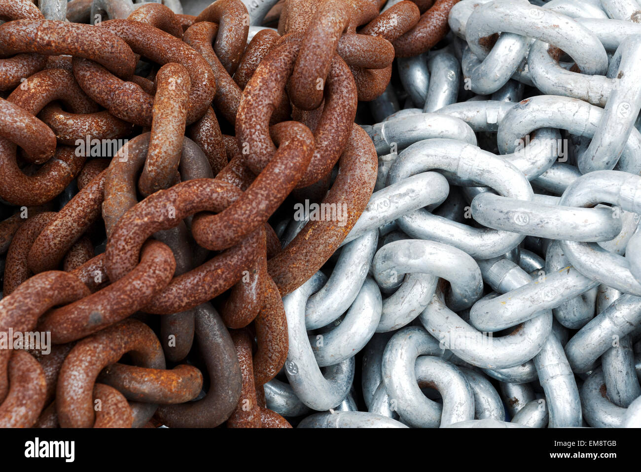 Close up of shiny and rusted metal chains Stock Photo - Alamy