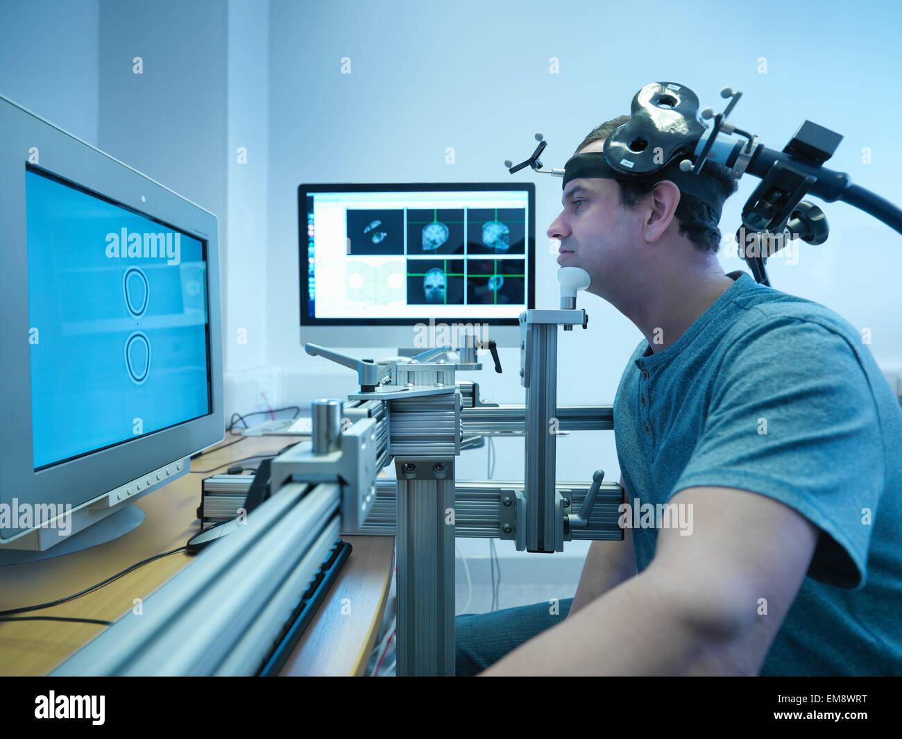 Patient in transcranial magnetic stimulation (TMS) experiment Stock Photo