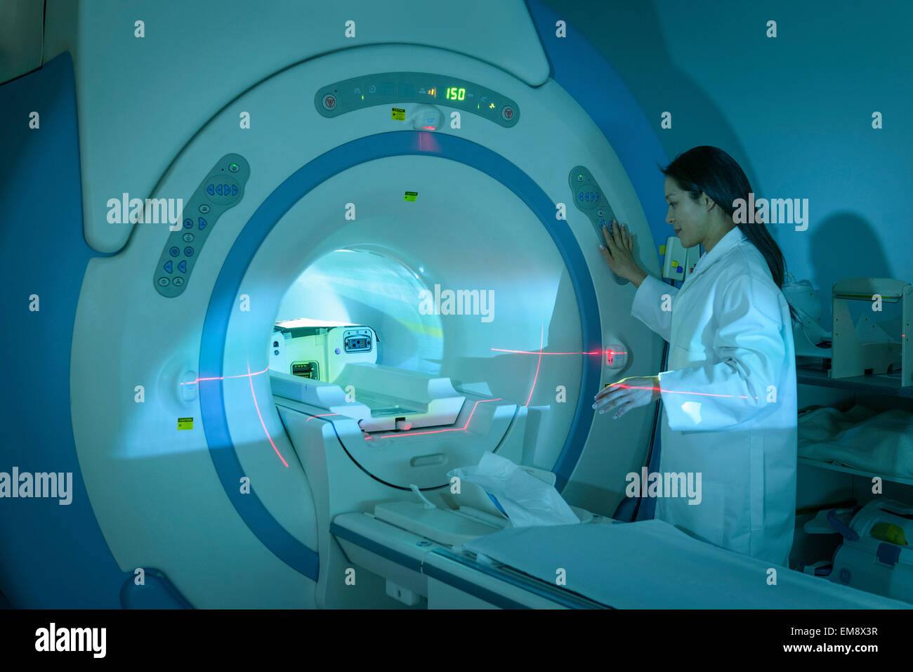 Doctor with Resonance Imaging (MRI) scanner, portrait Stock