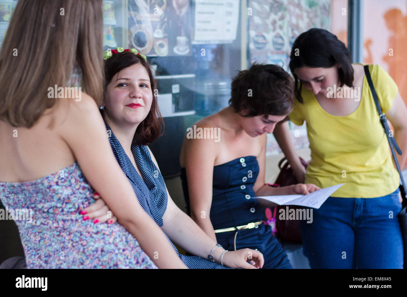 Students are staying near the window Stock Photo - Alamy