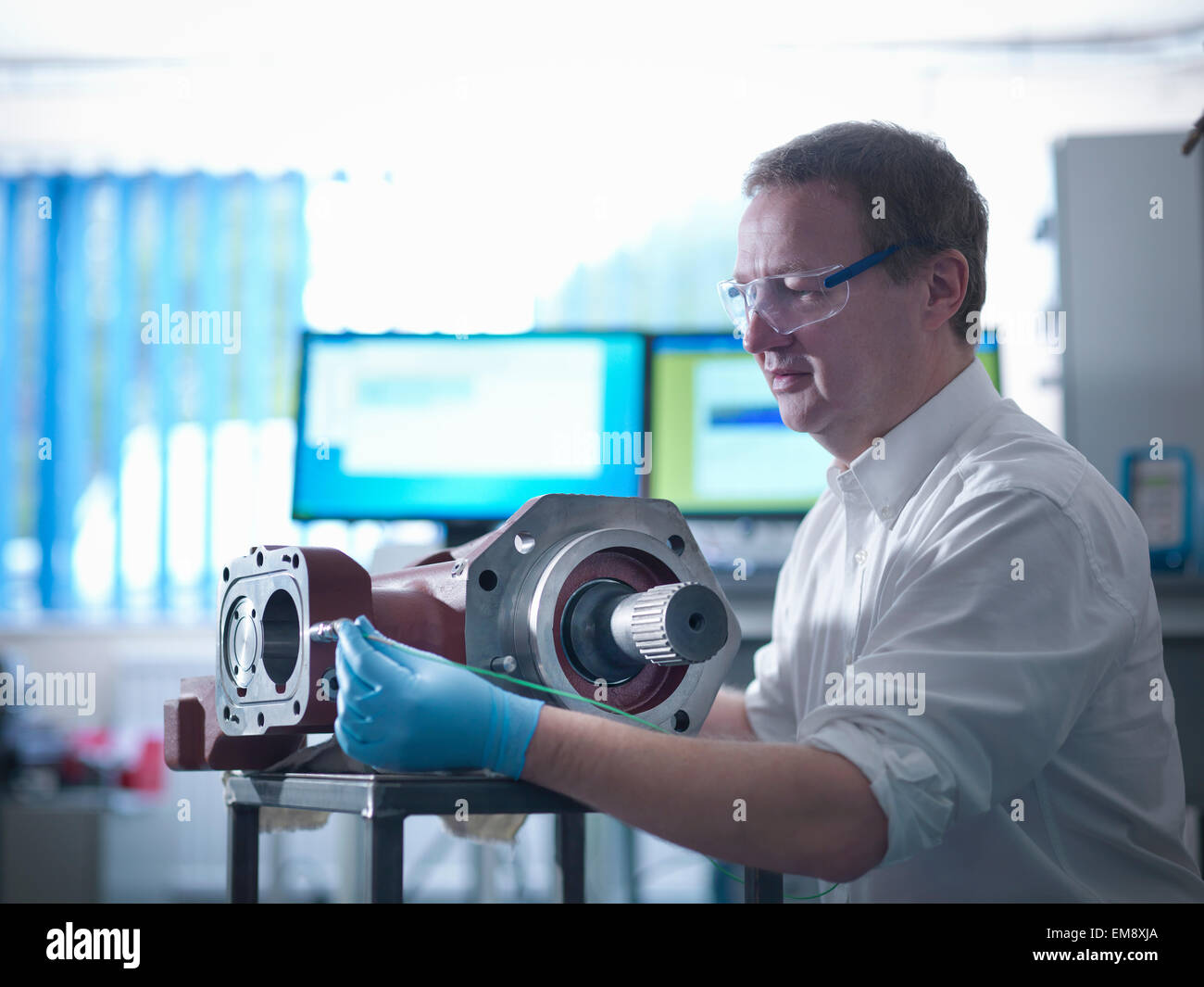 Engineer testing gear box in automotive test facility Stock Photo Alamy