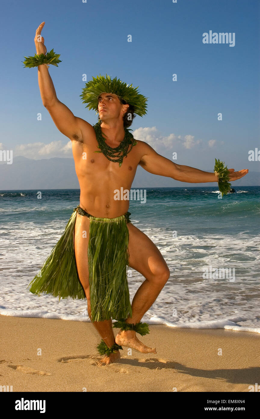 Male Hula Dancer In Ti Leaf Costume Haku Lei In A Dancing Pose On The Beach Stock Photo Alamy