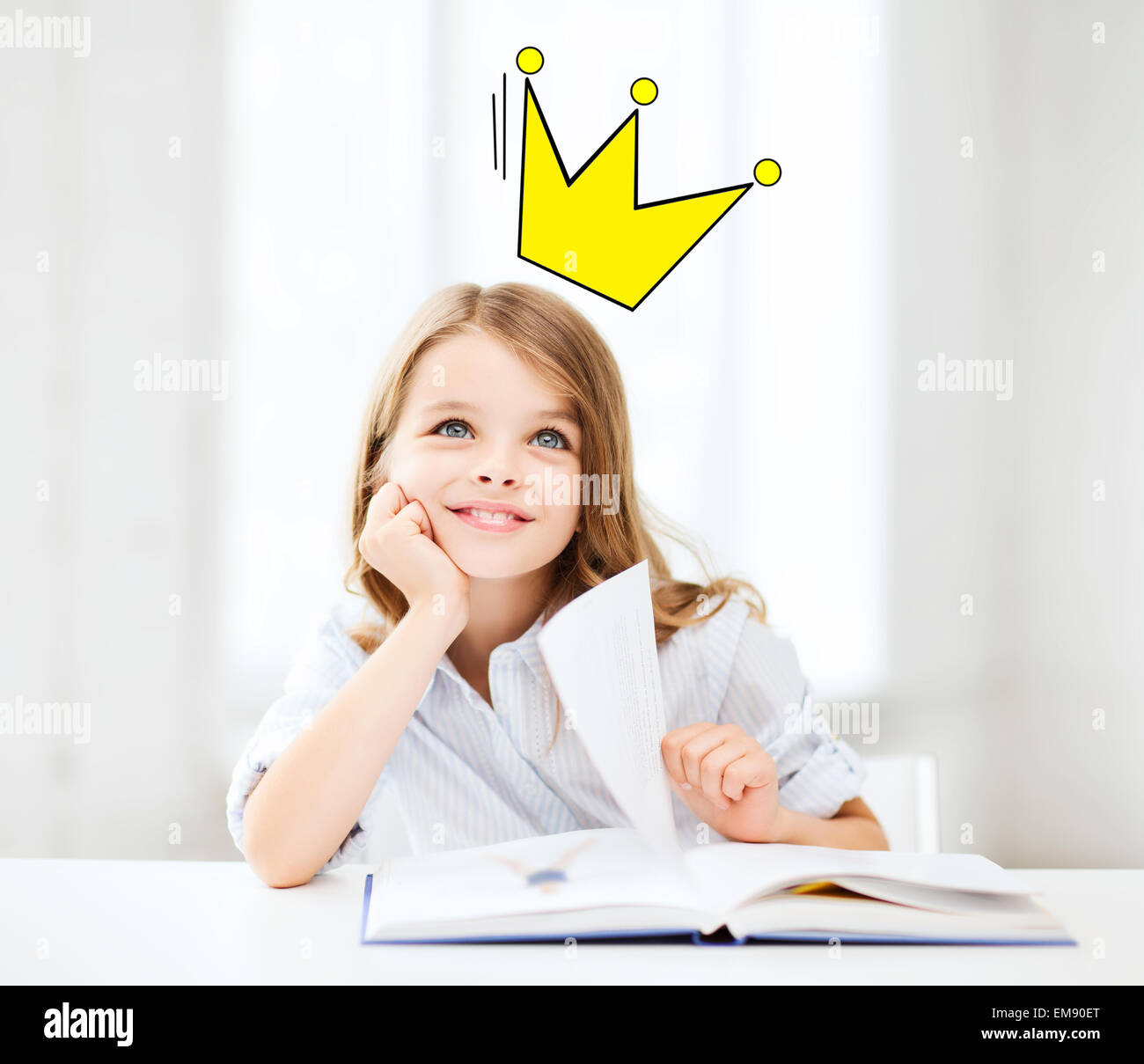smiling girl reading fairytales at home Stock Photo - Alamy