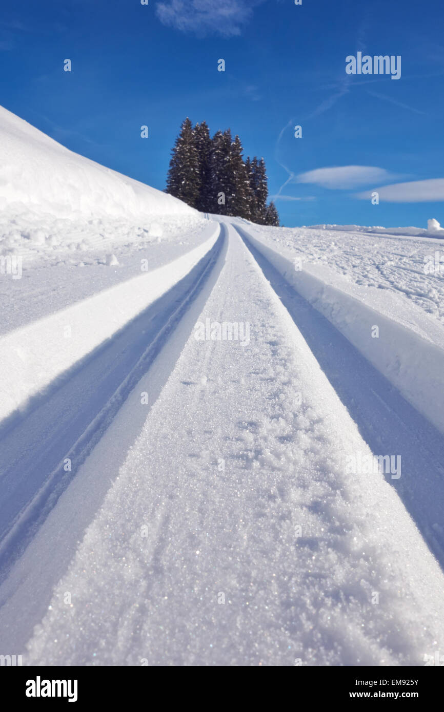 Tracks in deep snow, Kirchberg, Austria Stock Photo - Alamy