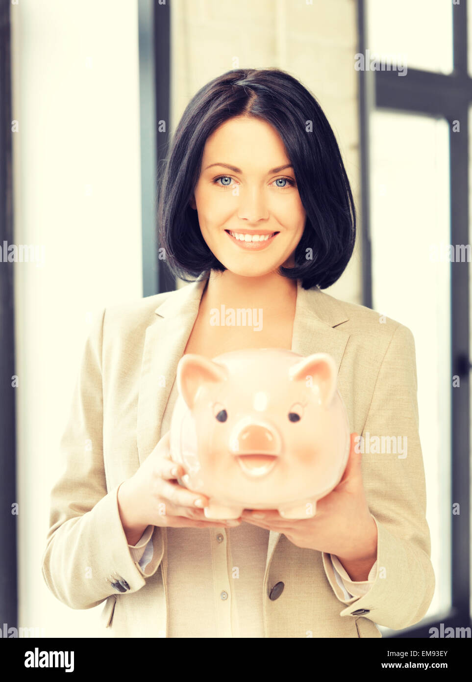 lovely woman with piggy bank Stock Photo - Alamy