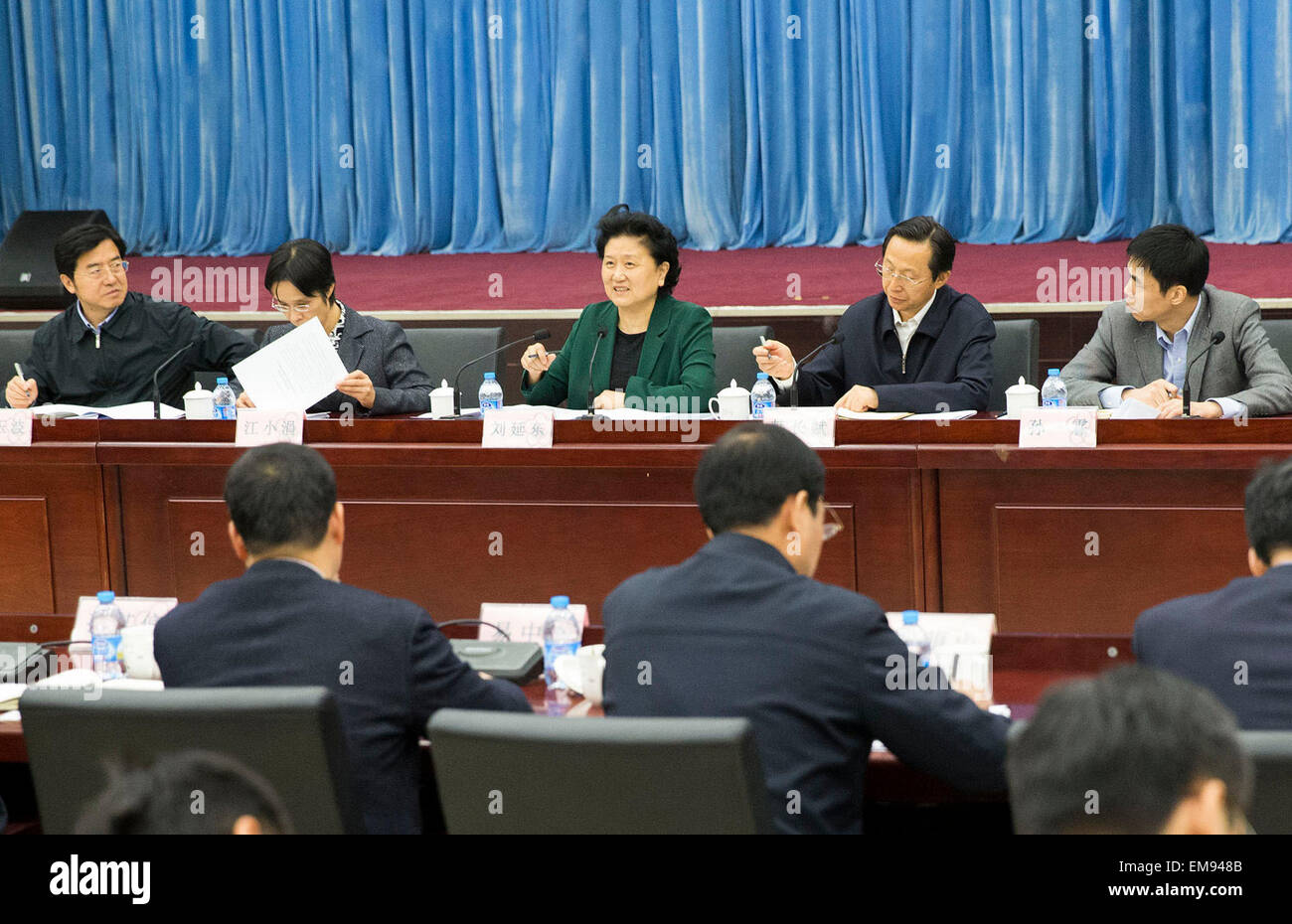 Beijing, China. 17th Apr, 2015. Chinese Vice Premier Liu Yandong (back C) speaks at a symposium about agricultural science and technology innovation in Beijing, capital of China, April 17, 2015. © Huang Jingwen/Xinhua/Alamy Live News Stock Photo