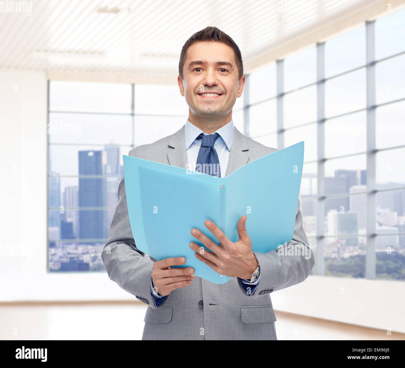 happy businessman with open folder Stock Photo