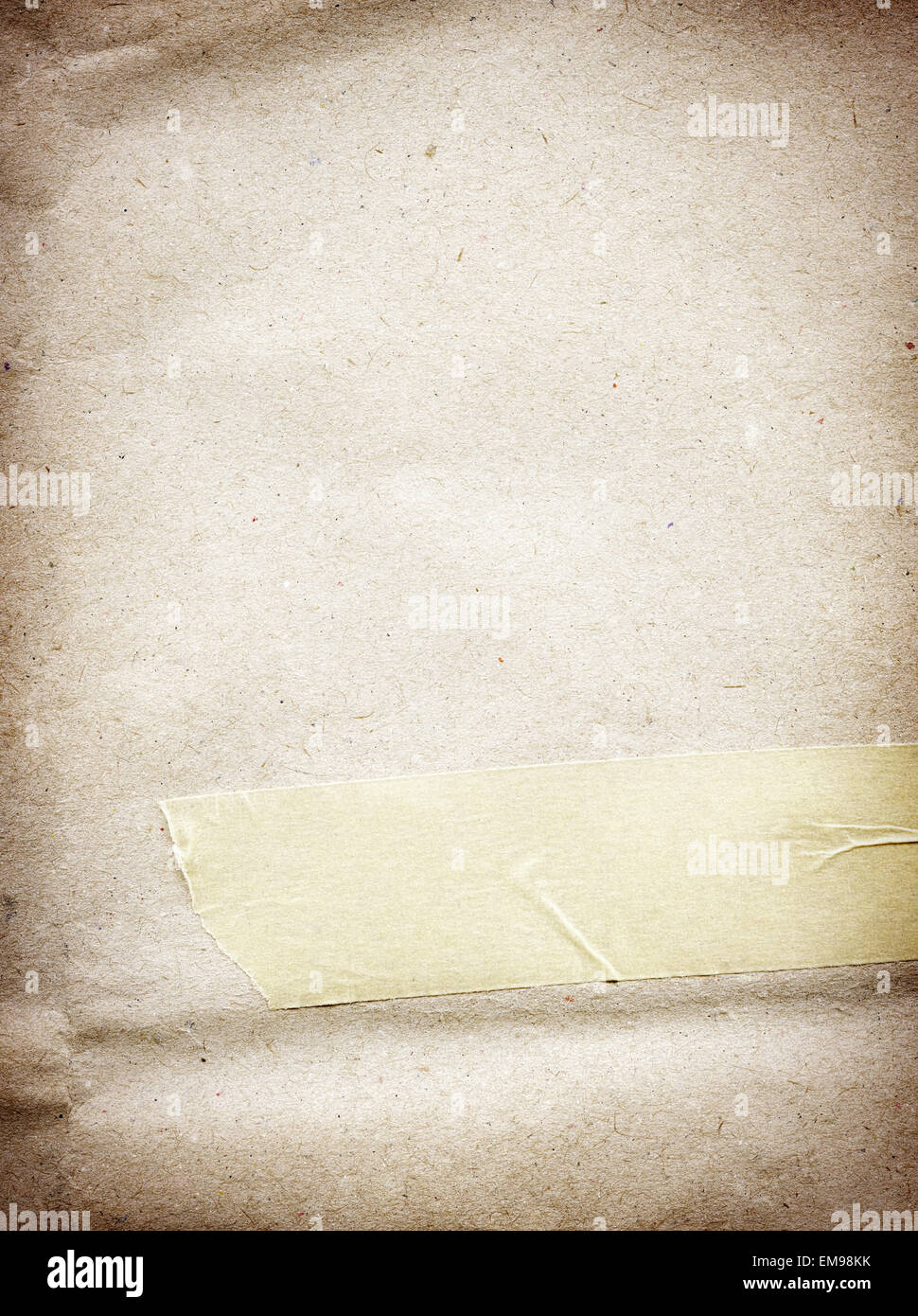 Brown parchment paper texture with adhesive, sticky tape Stock Photo