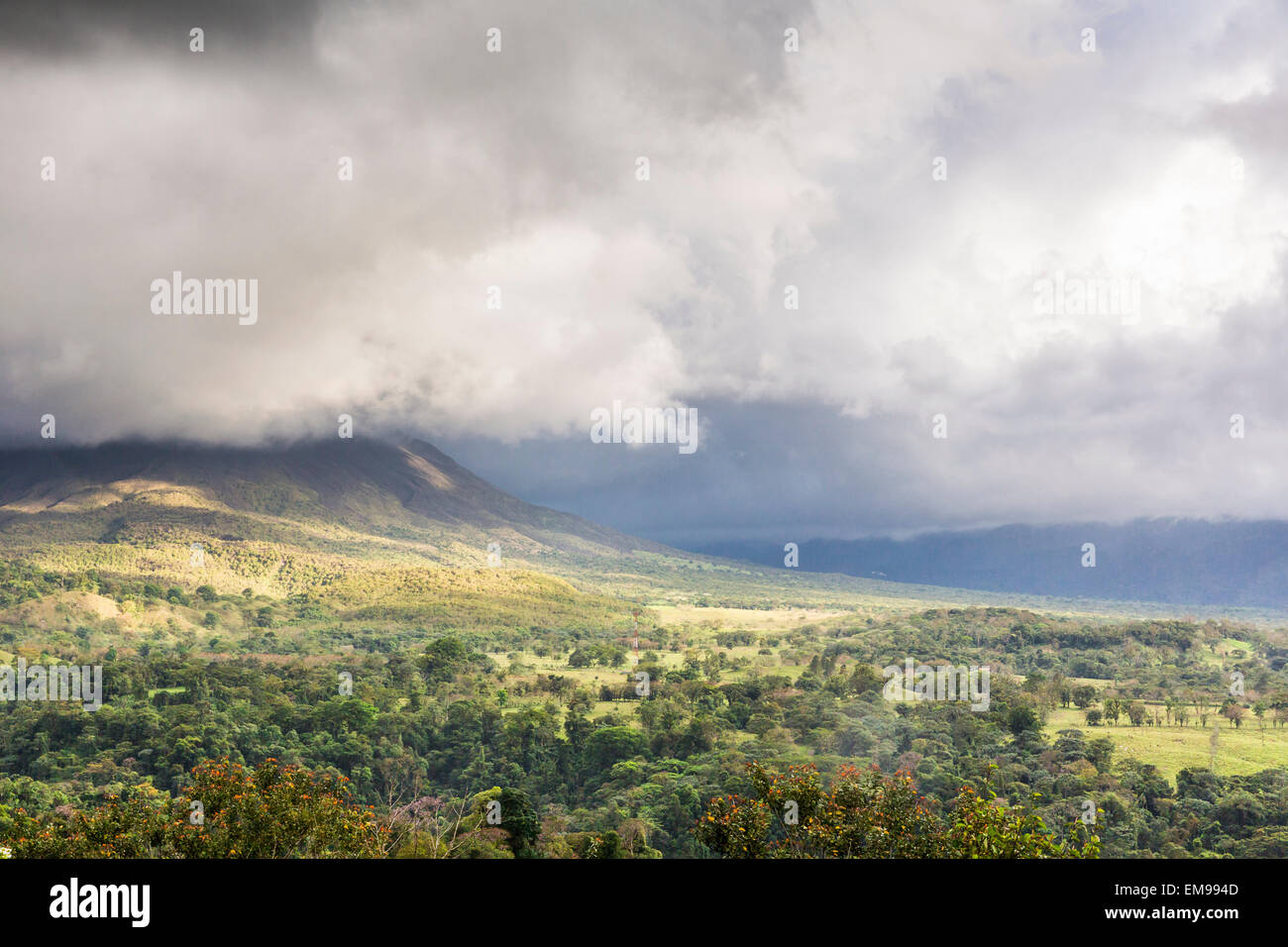 Weather storm front across valley in Arenal Volcano National Park, Alajuela, Costa Rica Stock Photo