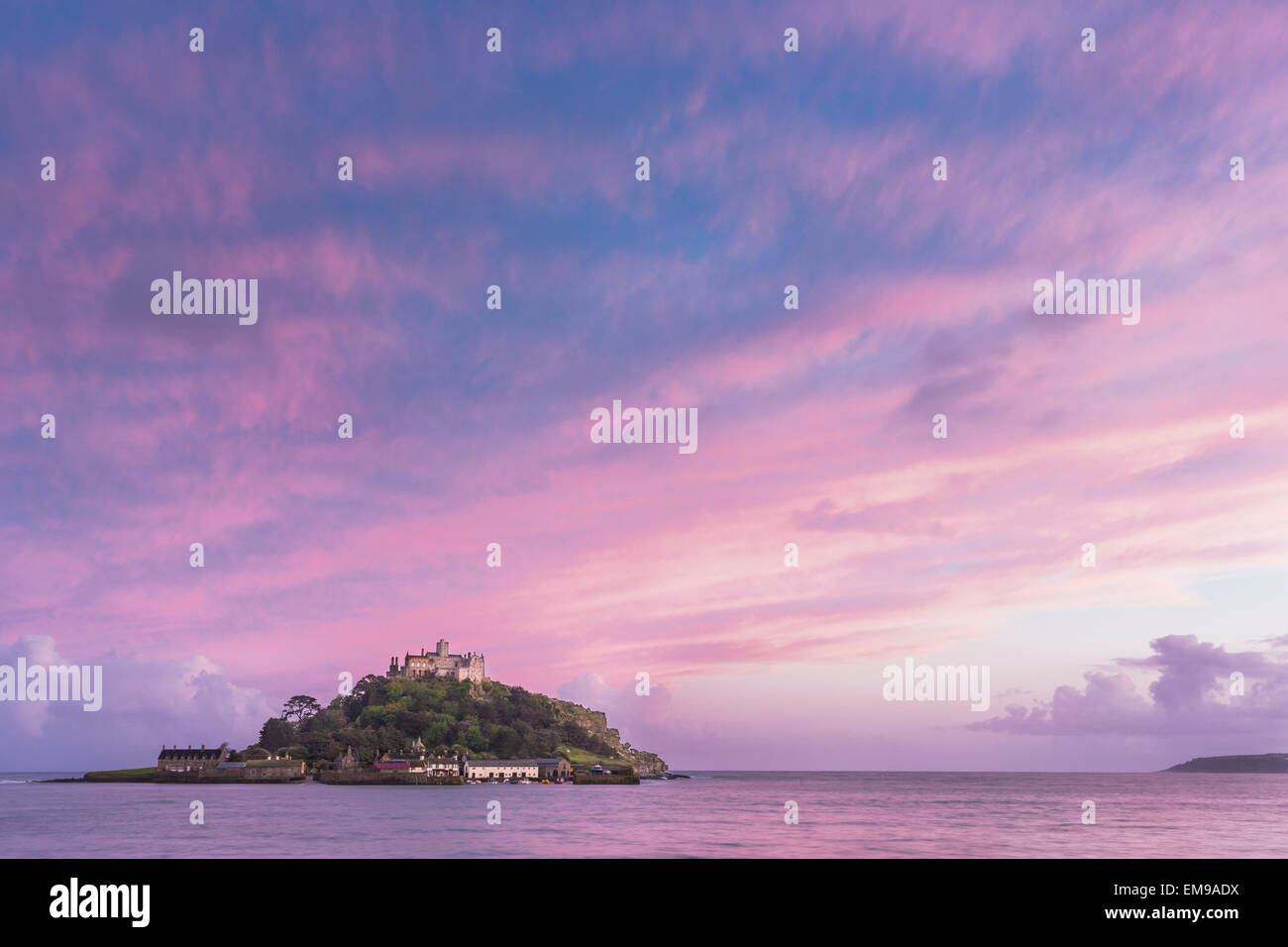 Beautiful late evening cloudscape sun set image of St Michaels Mount at Marazion Beach Cornwall Stock Photo