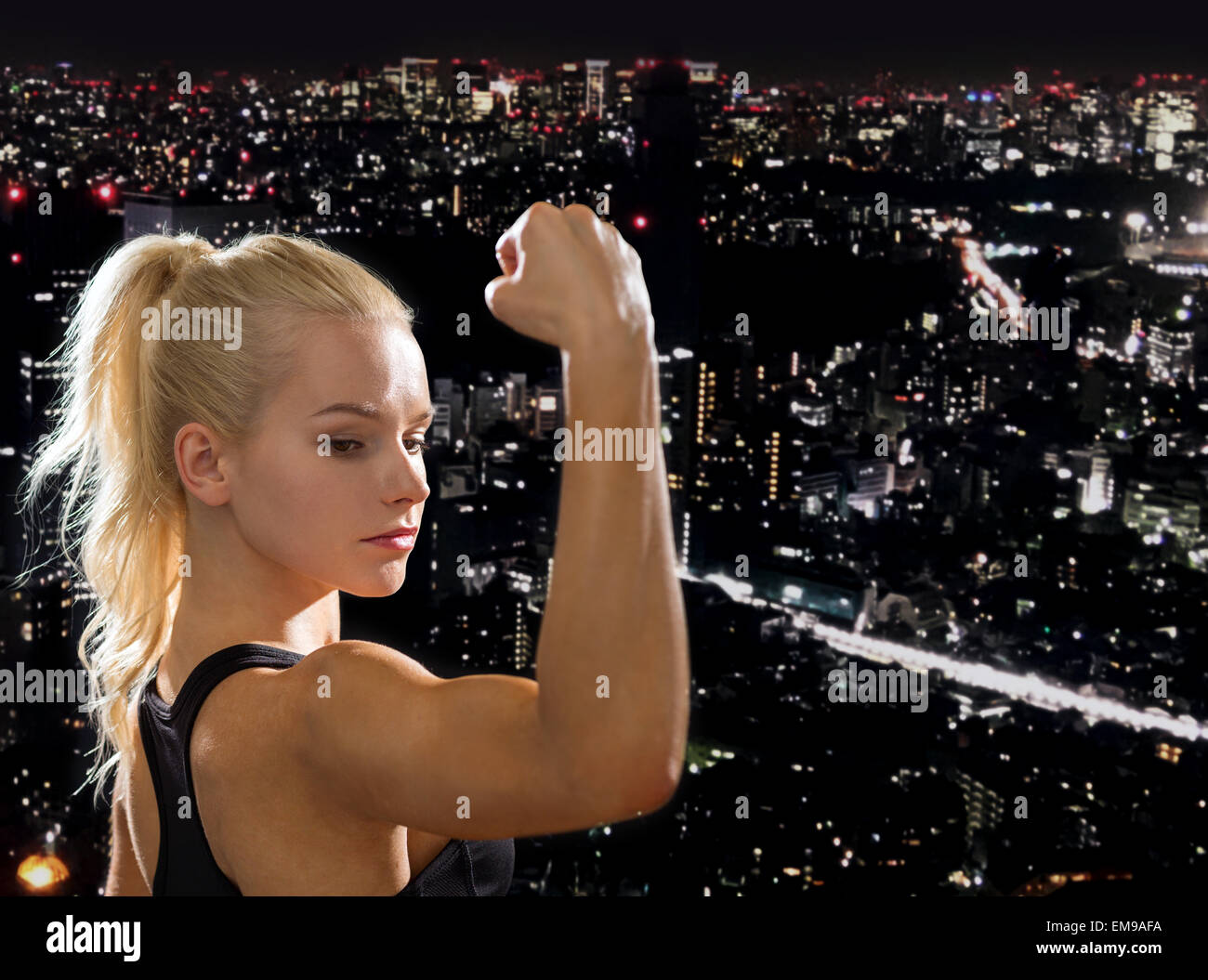 close up of athletic woman flexing her biceps Stock Photo - Alamy