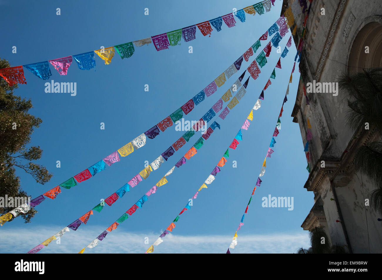 Paper Flags Decorate The Front Of The Church Of San Lorenzo, Zinacantan, Chiapas, Mexico Stock Photo