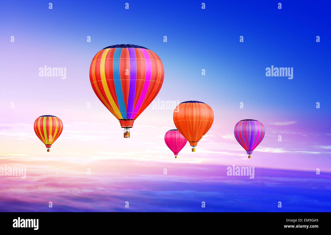 Many colorful hot air balloons in blue sky Stock Photo - Alamy