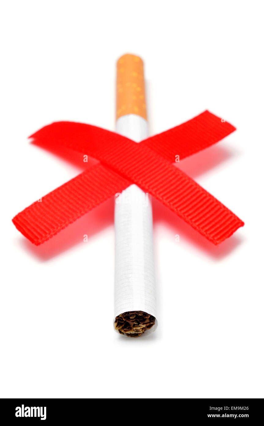 a cigarette and two crossed red slashes, depicting the concept of no smoking,  on a white background Stock Photo