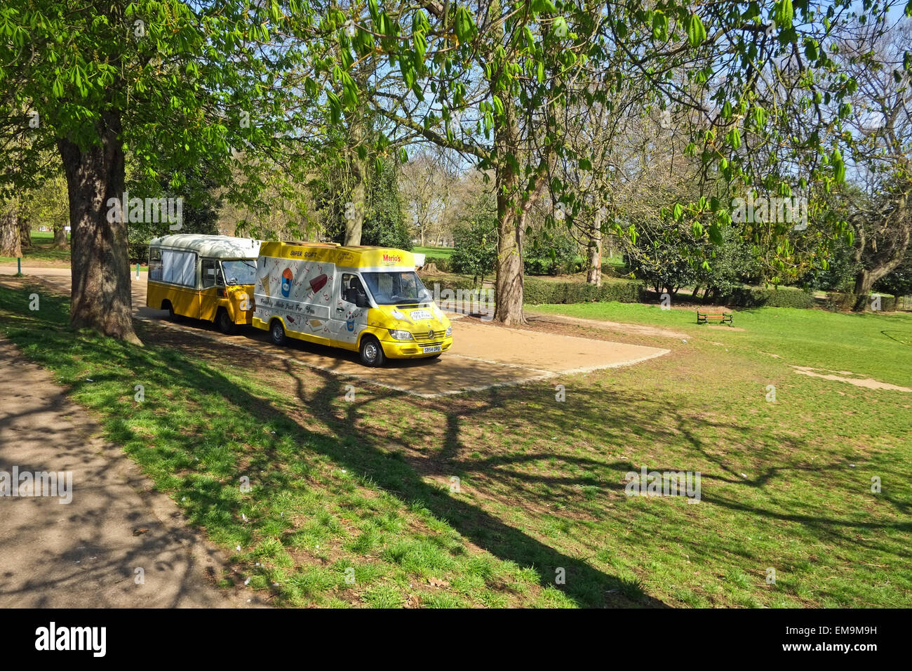 Ice cream vans with no customers in Public park Stock Photo