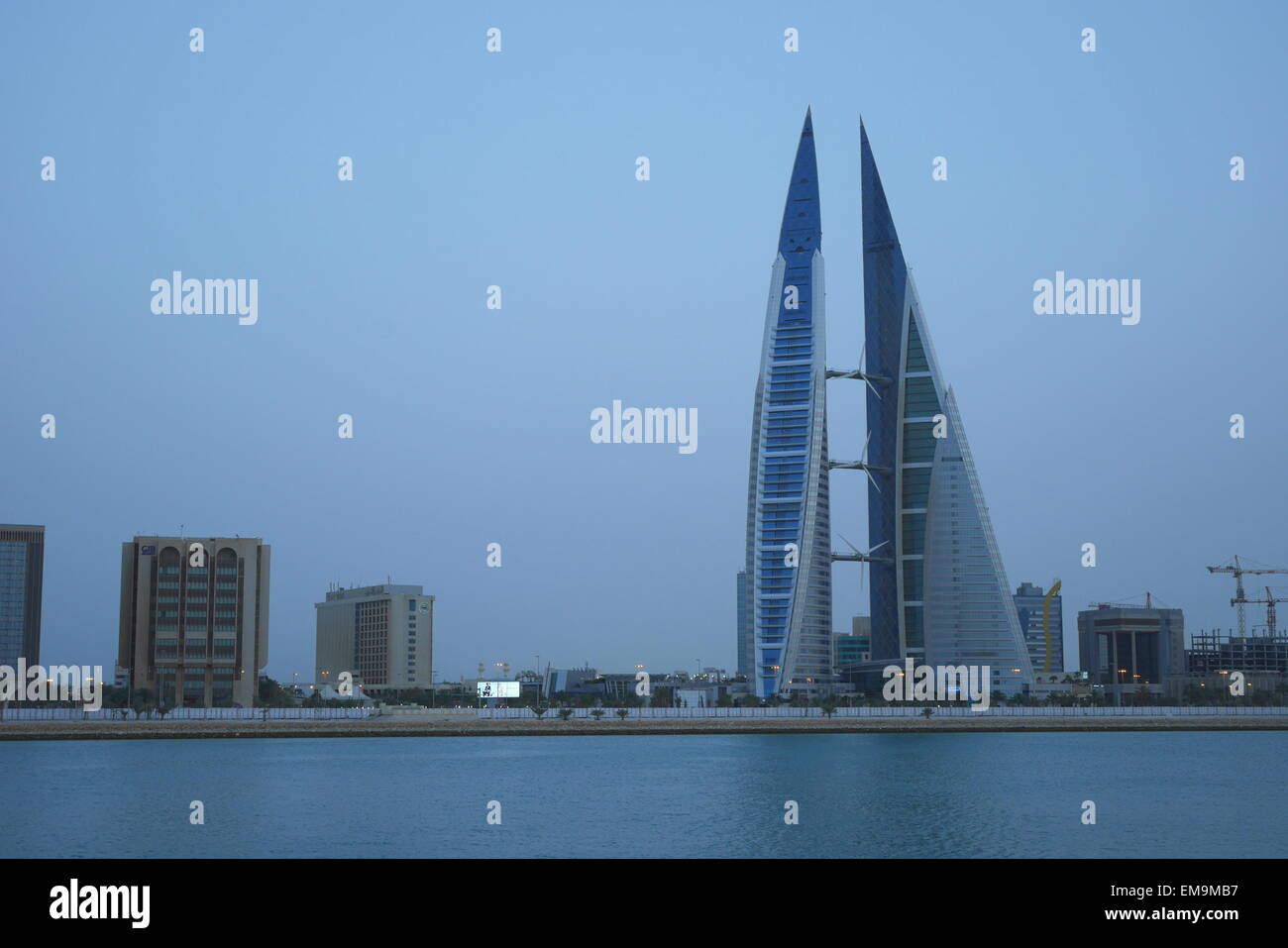 World Trade Centre Building from the Four Seasons Hotel at dusk, Manama, Kingdom of Bahrain Stock Photo