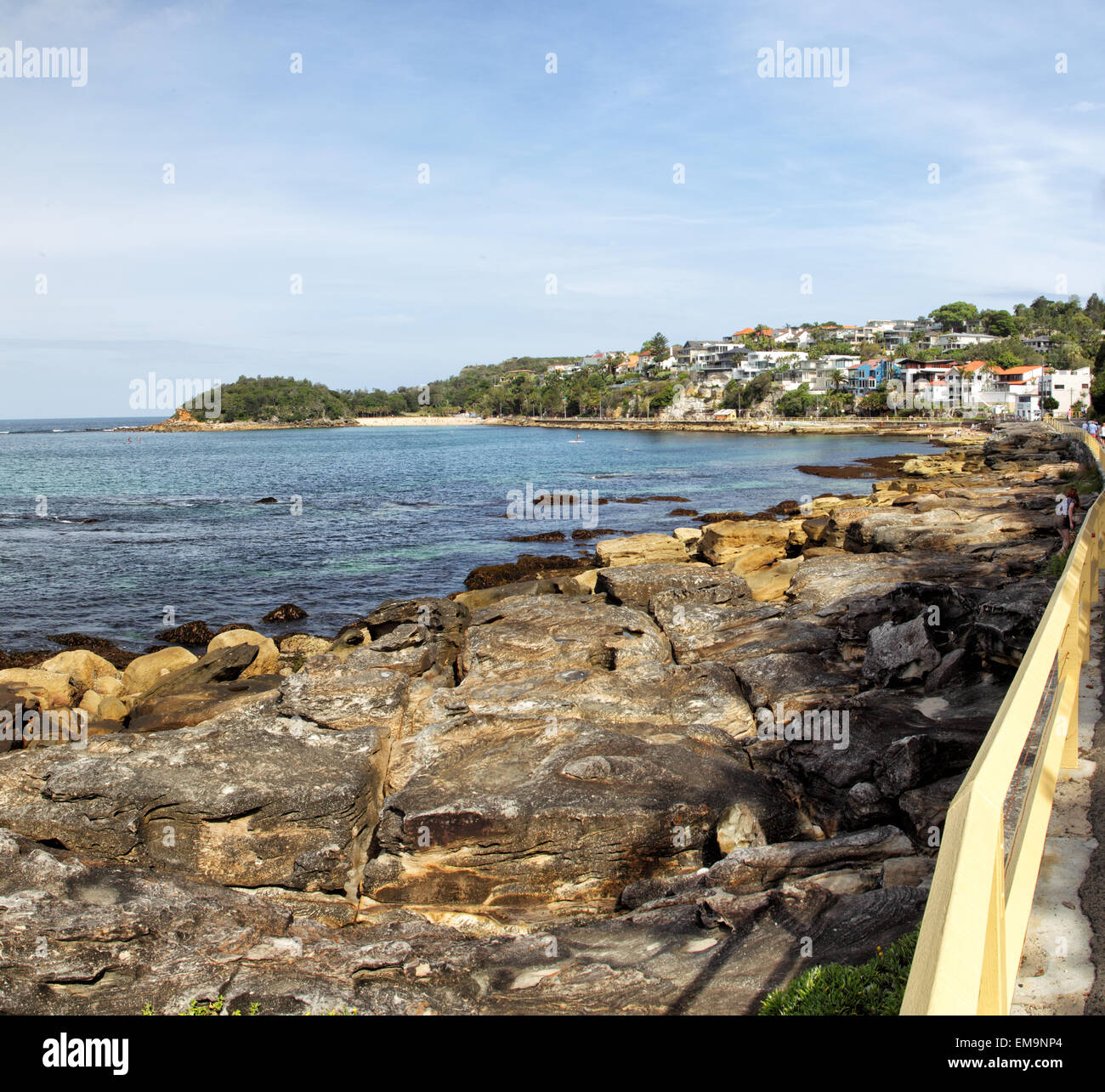 Rocky coast at the Cabbage Tree Bay and view towards Shelly Beach in Manly, Sydney, Australia Rocky coast at the Cabbage Tree Bay and view towards Shelly Beach in Manly, Sydney, Australia