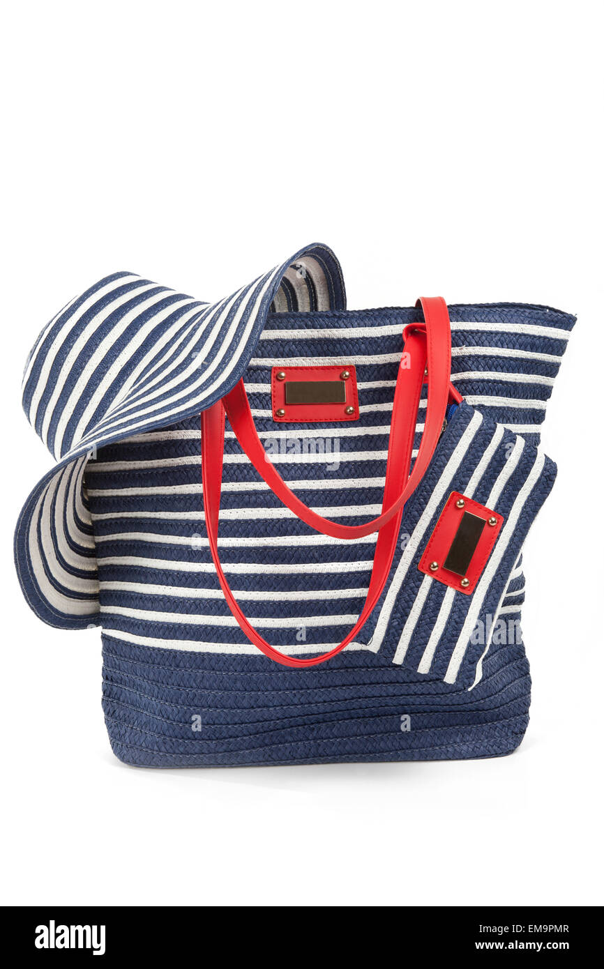 blue and white bag for beach with hat isolated Stock Photo