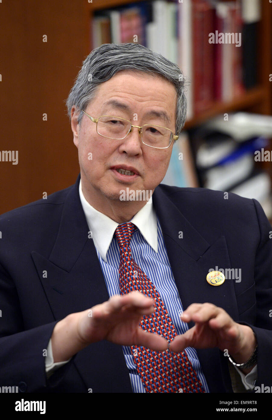 Washington, DC, USA. 17th Apr, 2015. China's central bank governor Zhou Xiaochuan speaks during an interview in Washington, DC, capital of the United States, April 17, 2015. Members of the International Monetary Fund (IMF) are frustrated with the long-delayed 2010 quota reform of the fund and called for early passage of the reform, said Zhou here Friday. © Yin Bogu/Xinhua/Alamy Live News Stock Photo