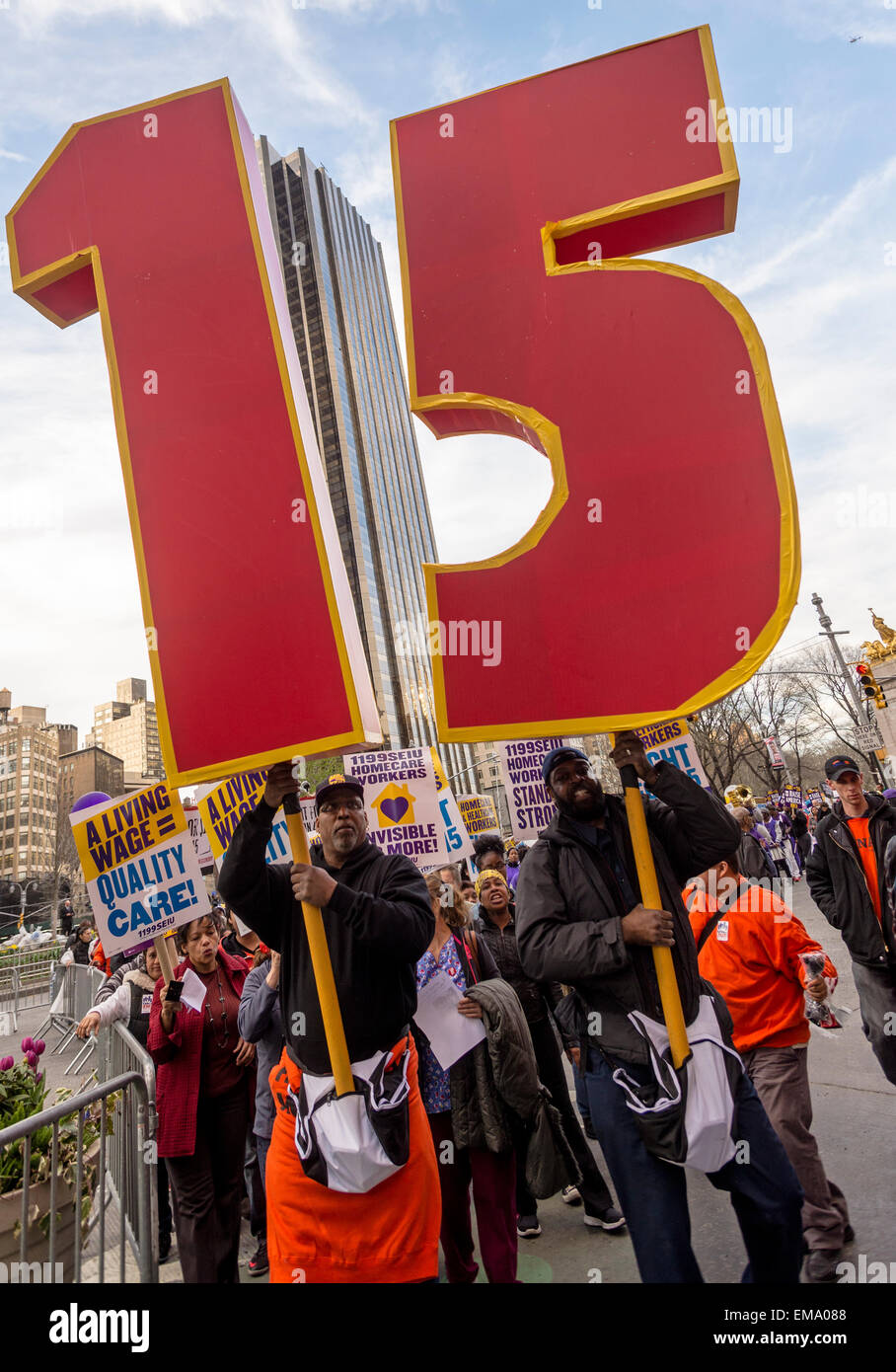 New York, USA. 15th April, 2015. Thousands of Union Members joined Fast Food Workers in a march from Columbus Circle to 42nd Street in Times Square, calling for the minimum wage to be raised to $15 an hour and the right for Fast Food workers to unionize. Workers are currently paid about $8.75 an hour. ©Stacy Walsh Rosenstock/Alamy Stock Photo