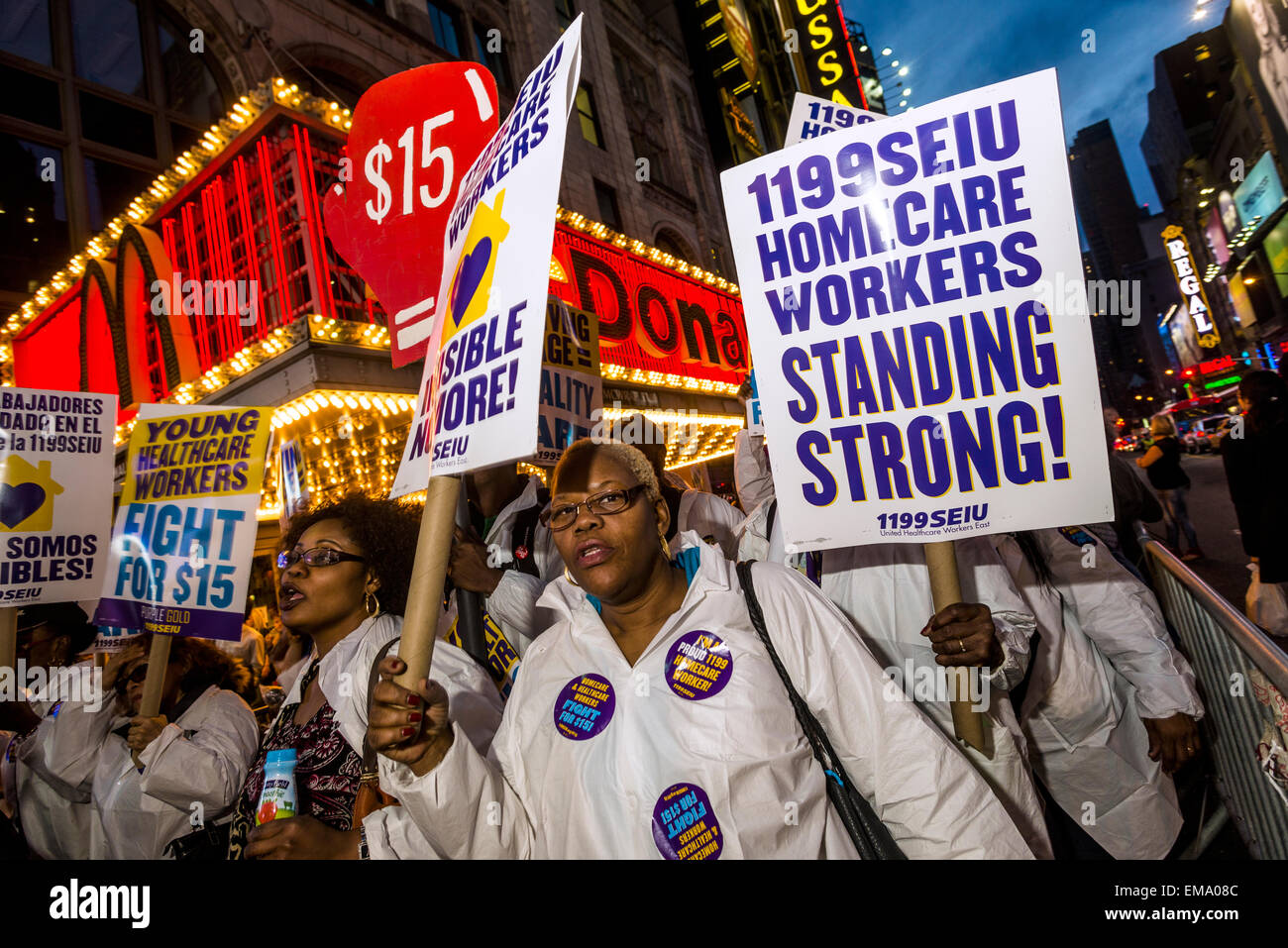 New York, USA. 15th April, 2015. Thousands of Union Members joined Fast Food Workers in a march from Columbus Circle to 42nd Street in Times Square, calling for the minimum wage to be raised to $15 an hour and the right for Fast Food workers to unionize. Workers are currently paid about $8.75 an hour. ©Stacy Walsh Rosenstock/Alamy Stock Photo