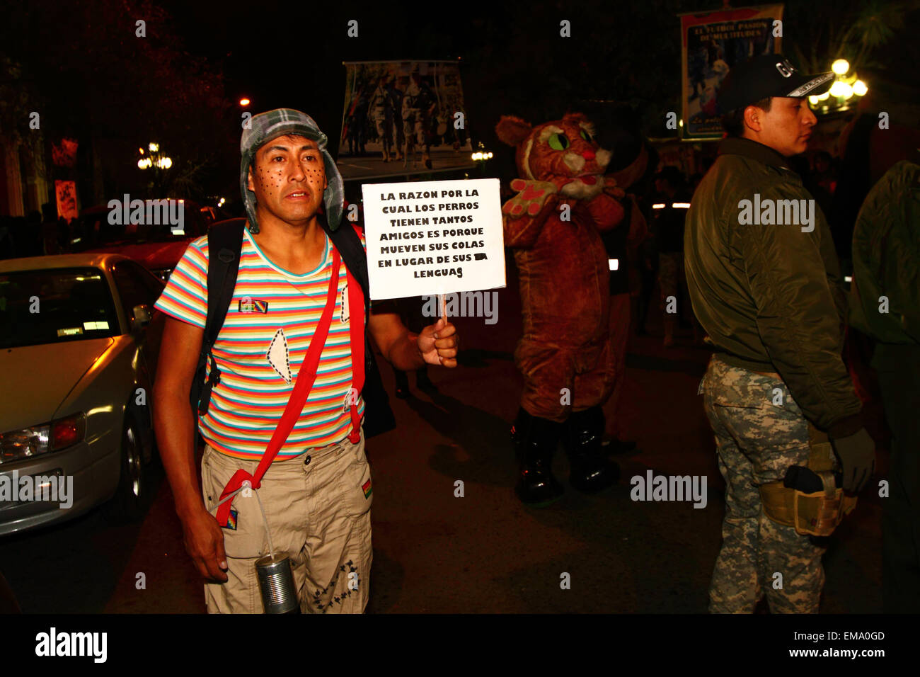 La Paz, Bolivia, 17th April 2015. A man dressed up as the famous Mexican TV character El Chavo from the sitcom El Chavo del Ocho takes part in a march to demand the government passes laws to protect animals from abuse, and to increase punishments for those found guilty of cruelty towards animals. Credit:  James Brunker / Alamy Live News Stock Photo