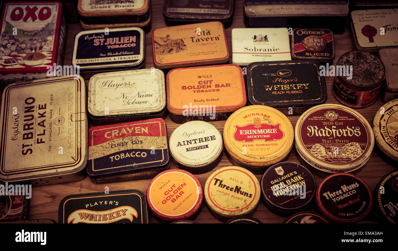 A collection of historic tobacco snuff and cookery tins at a vintage