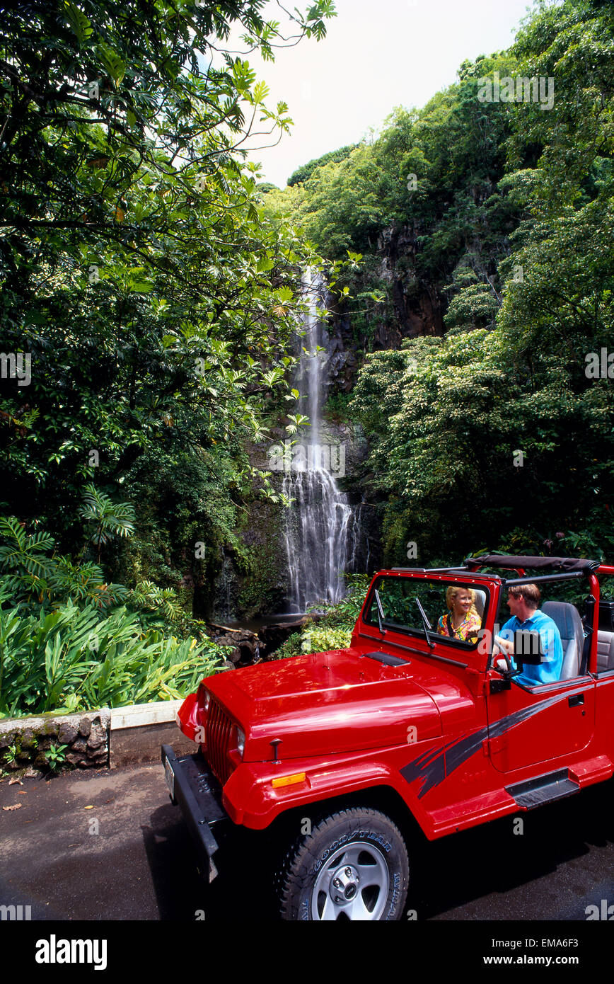 Hawaii, Maui, Hana Highway, Couple In Rental Jeep, View Waterfall