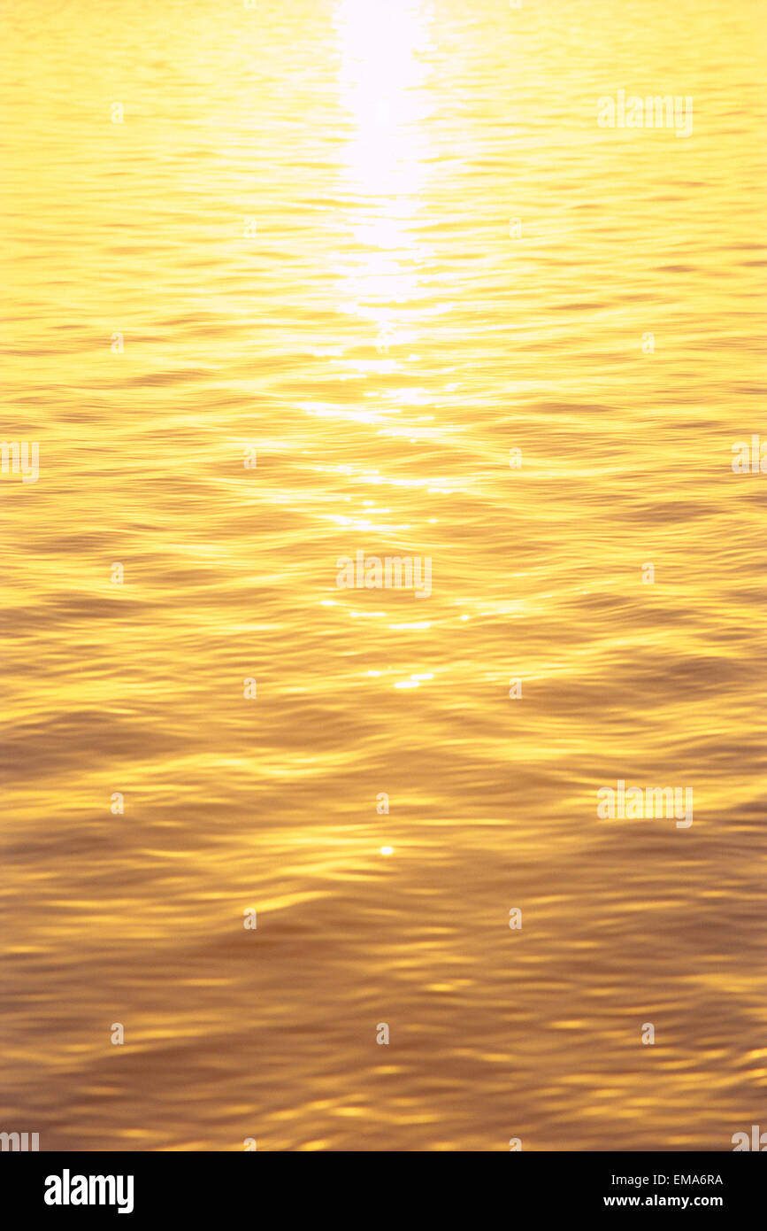 Golden Reflections On Ocean Water B1463 Stock Photo - Alamy