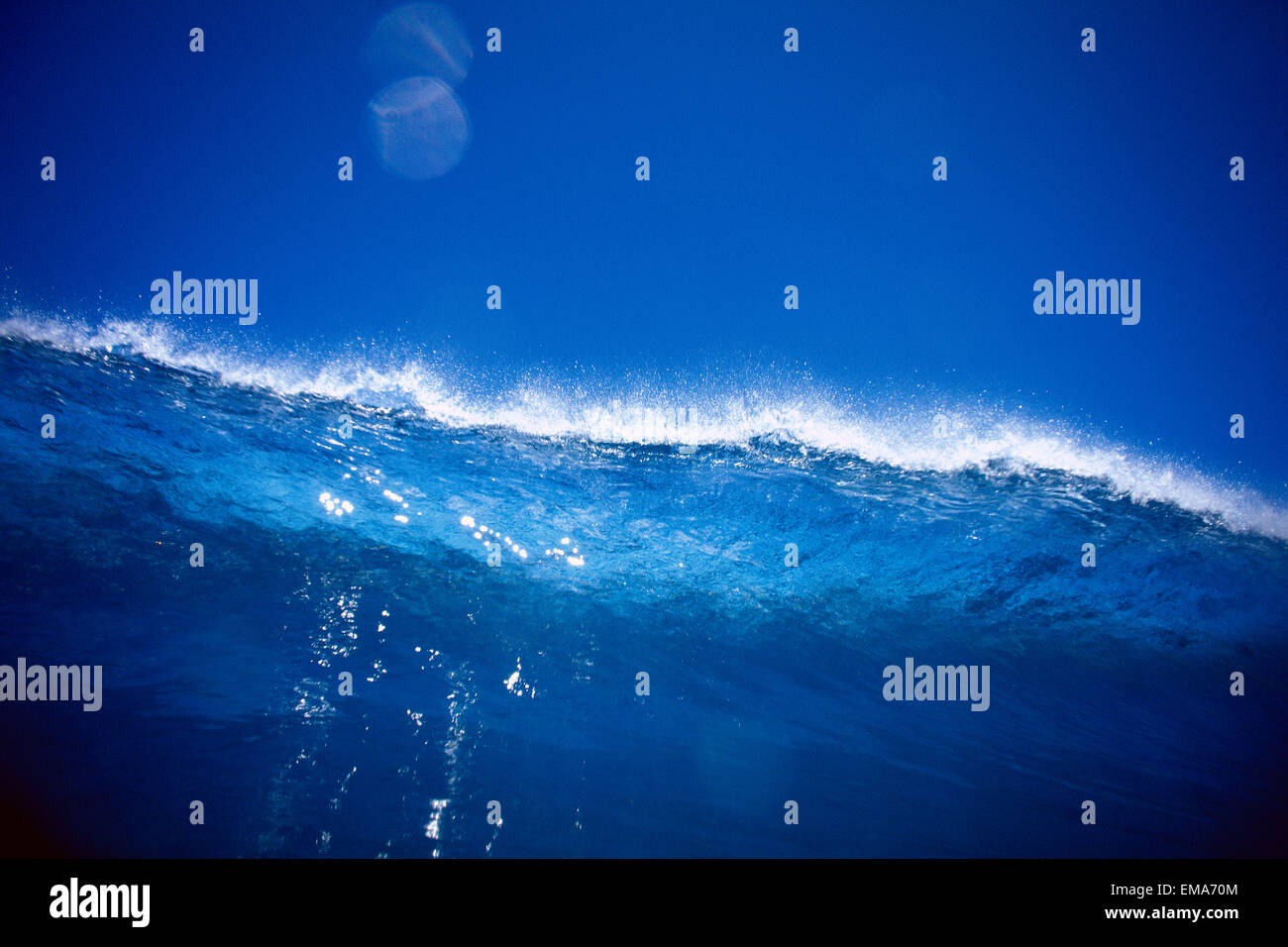 Translucent Blue Wave Against Blue Sky B1482 Stock Photo - Alamy