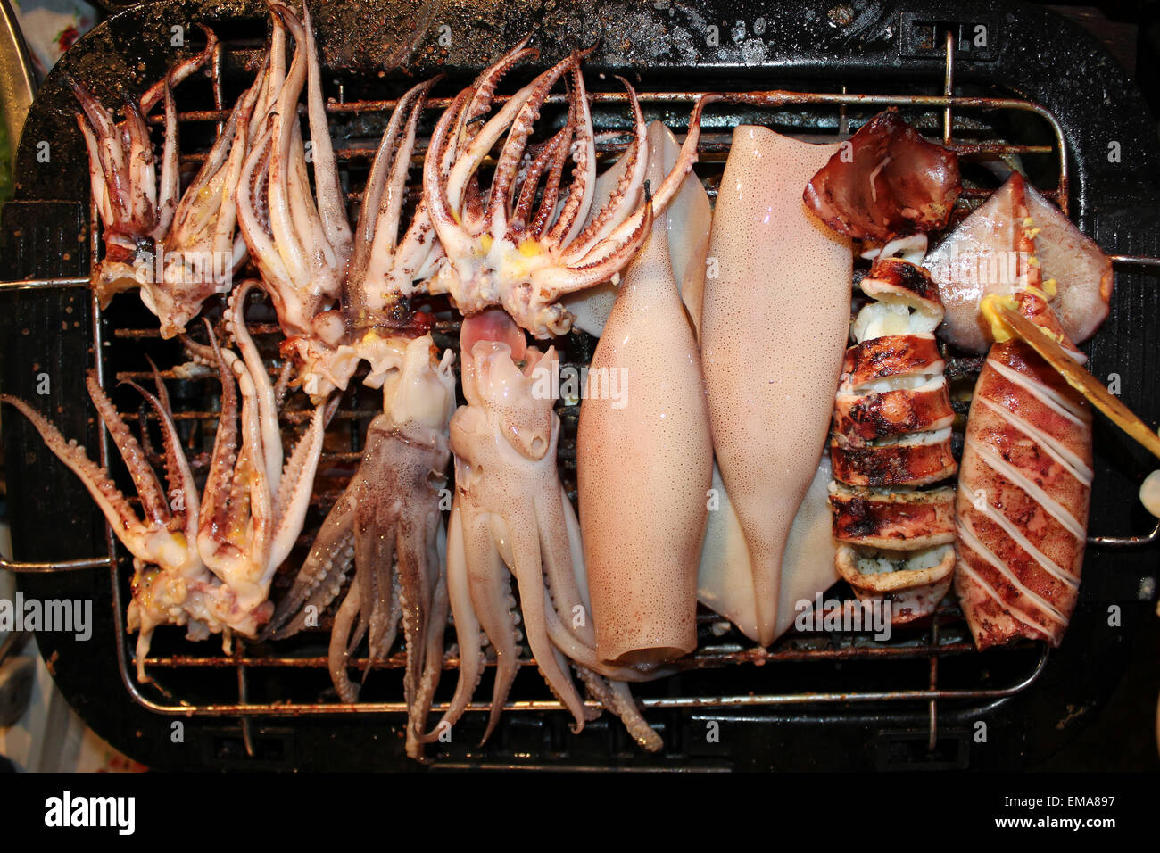 Squid Grilling On Barb-b-que Stock Photo