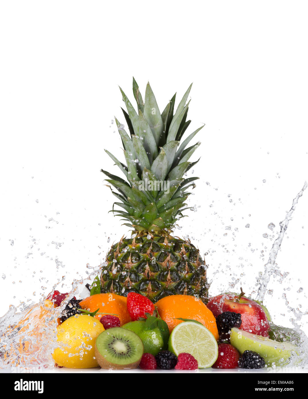 Mix of fruit with water splashes isolated on white background Stock Photo