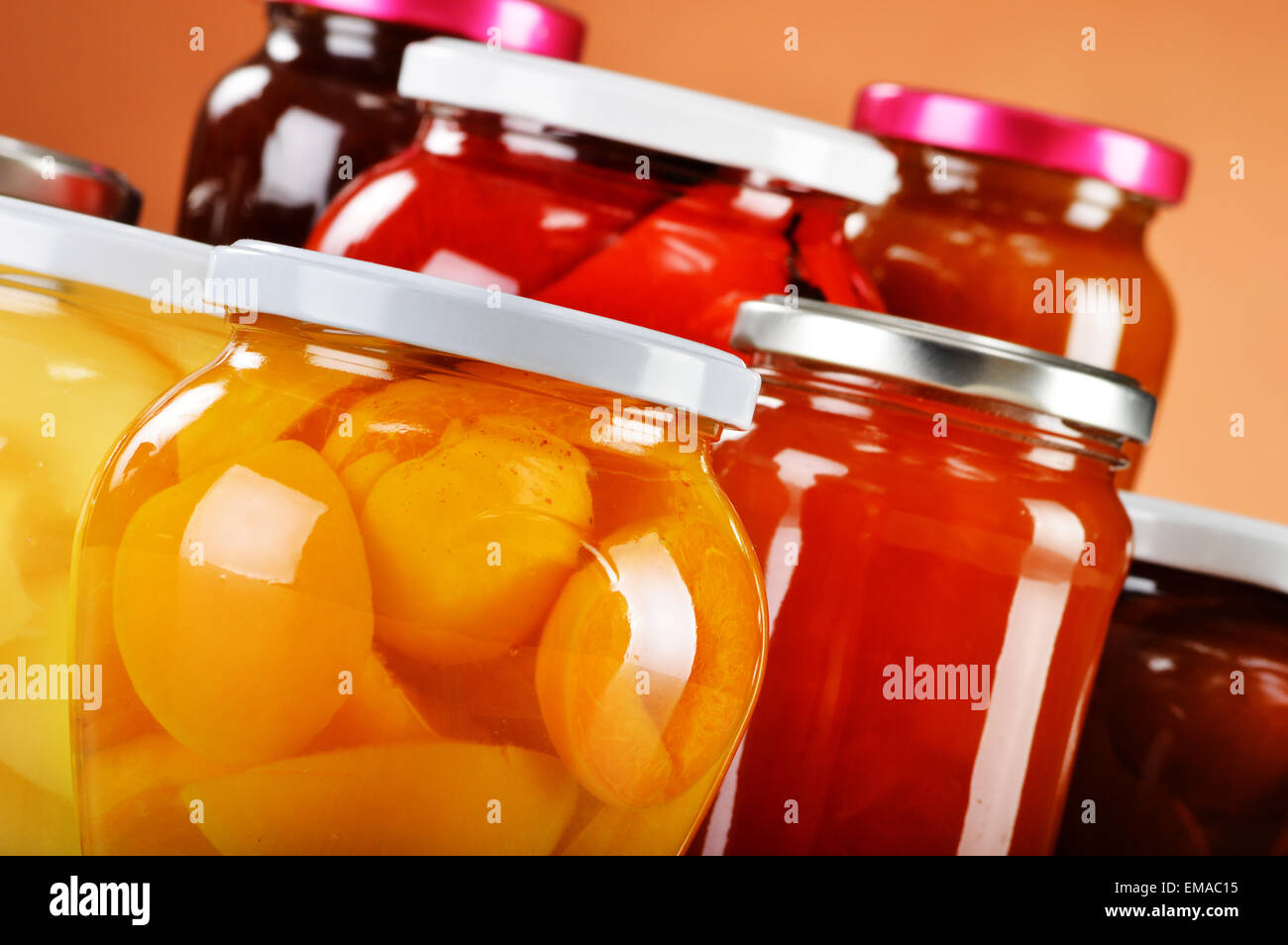 Jars with fruity compotes and jams. Preserved fruits Stock Photo Alamy