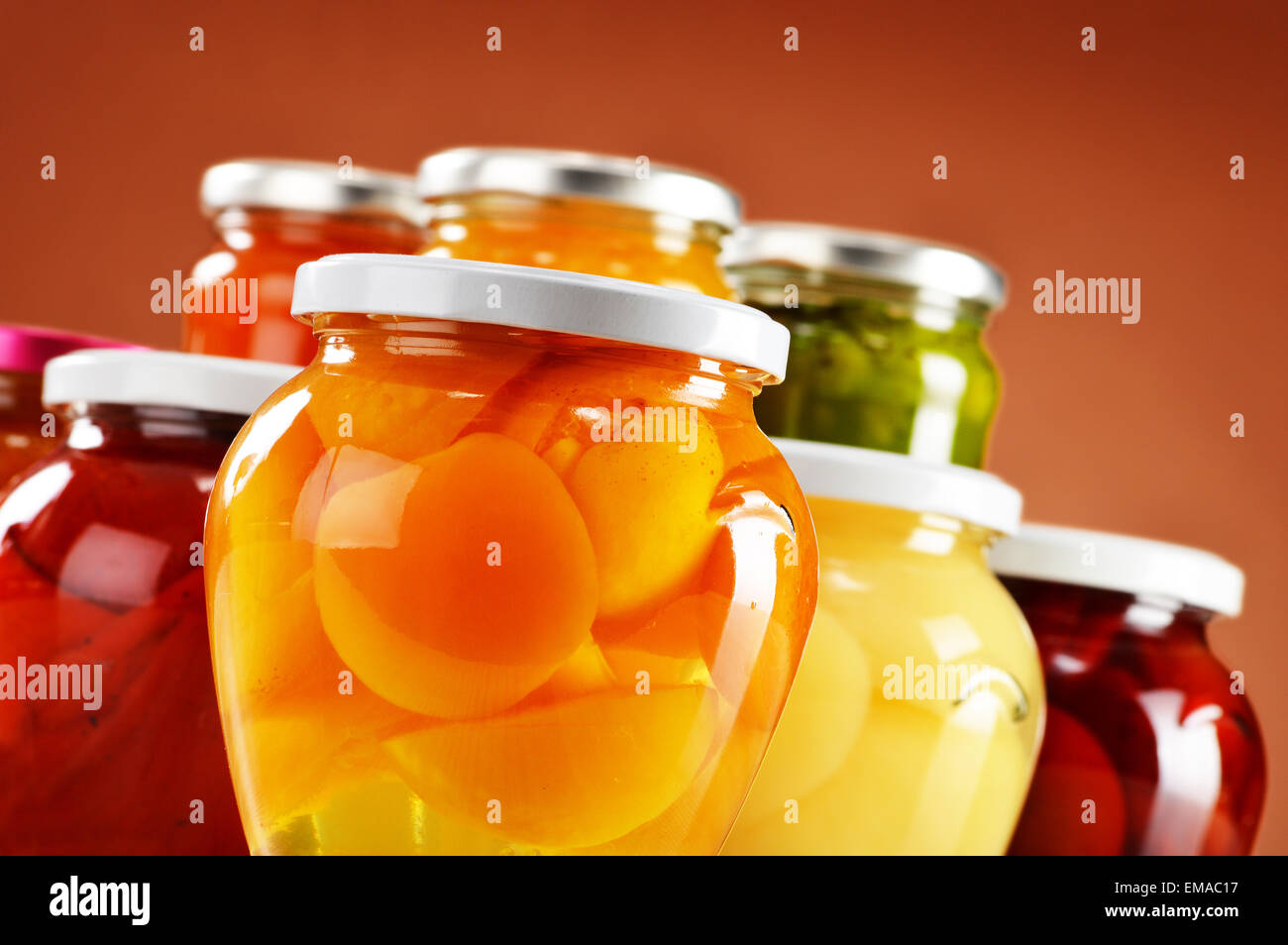 Jars with fruity compotes and jams. Preserved fruits Stock Photo Alamy