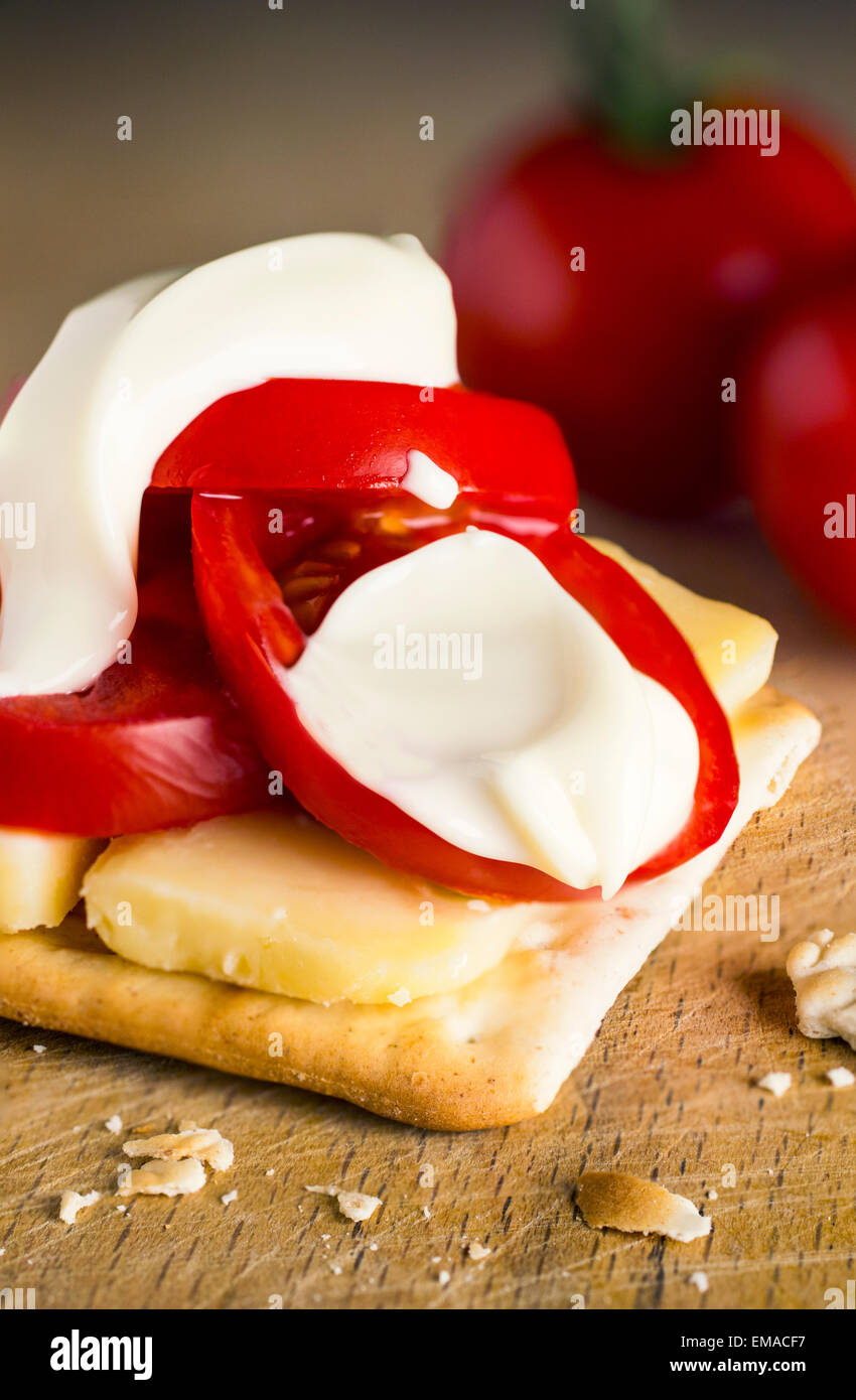 tomato cheese and mayonnaise ( mayo ) on cracker Stock Photo Alamy