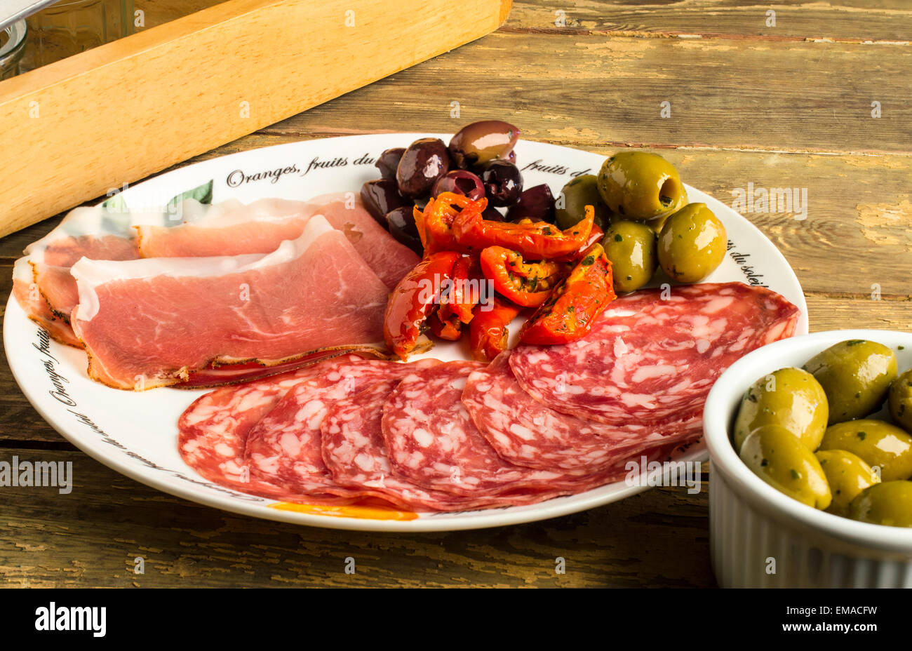 A plate of antipasti Greek Halkidiki olives, Kalamata Olives, semi