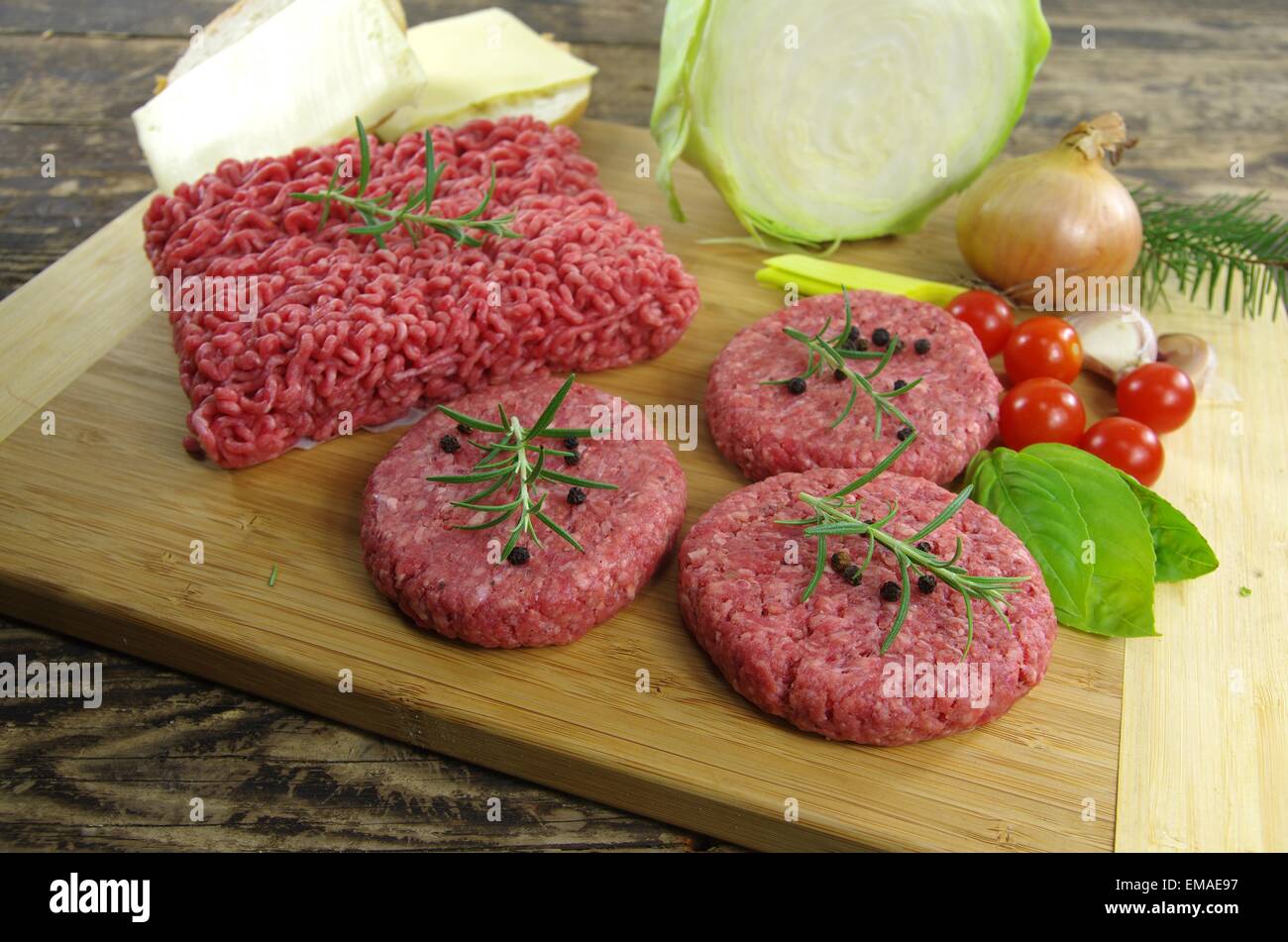 raw minced beef meat with onion and tomatoes Stock Photo Alamy