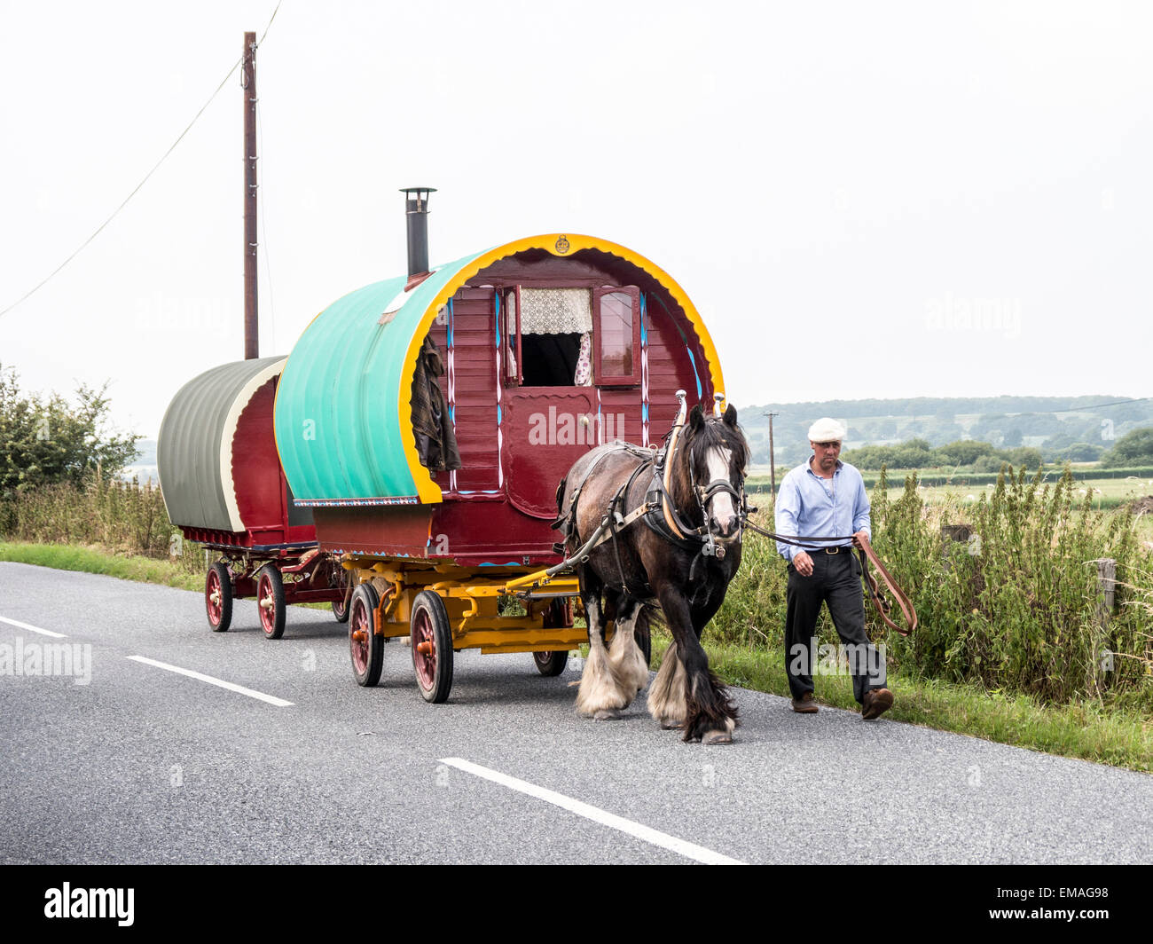 Two Romani caravans traveling the roads of Kent near Romney Marsh. Stock Photo