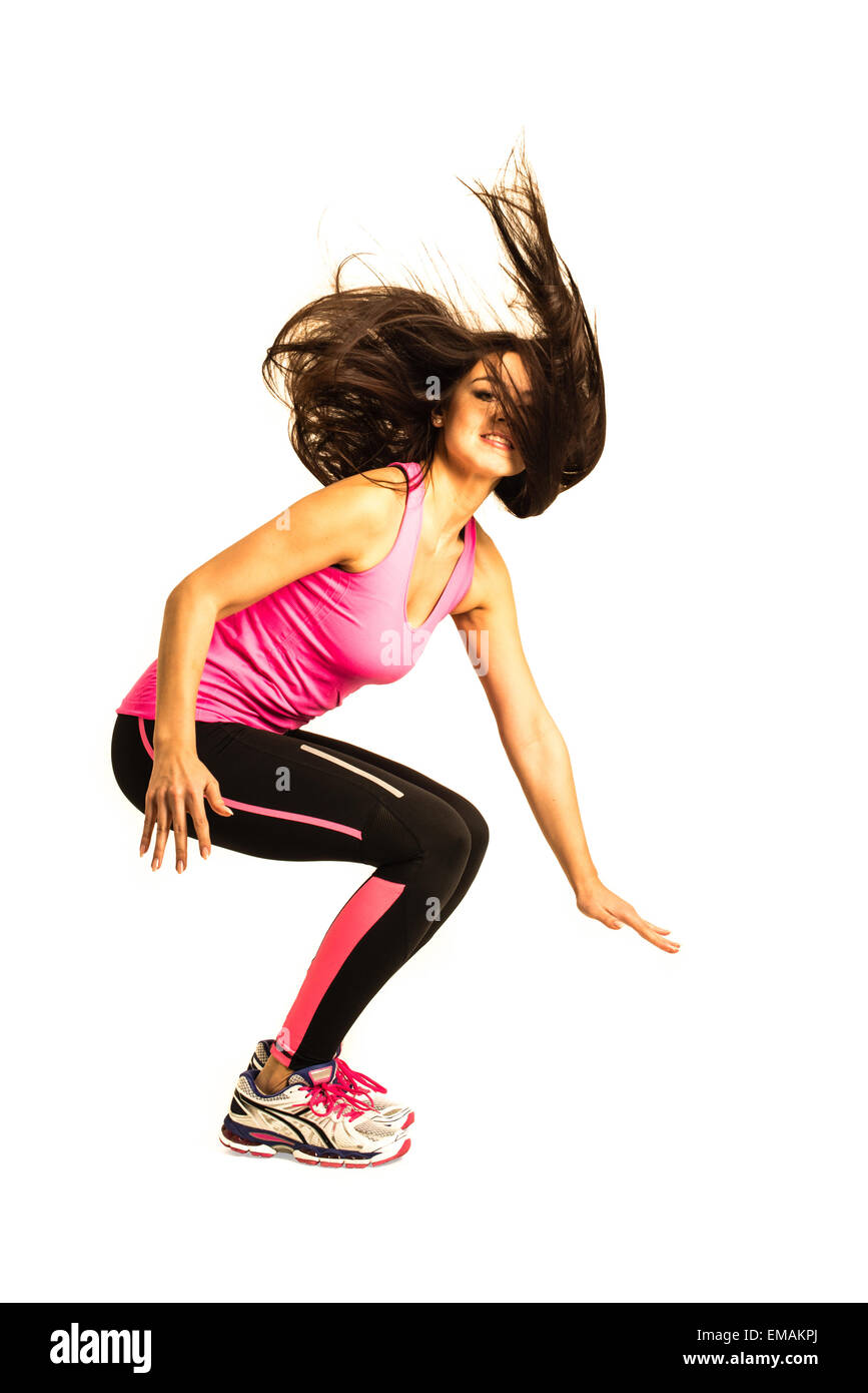 Sportive young woman jumping isolated on white background Stock Photo ...