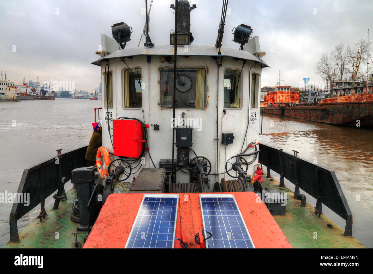Working on board at beaconing ship at Demarchi Island Port, River Plate ...