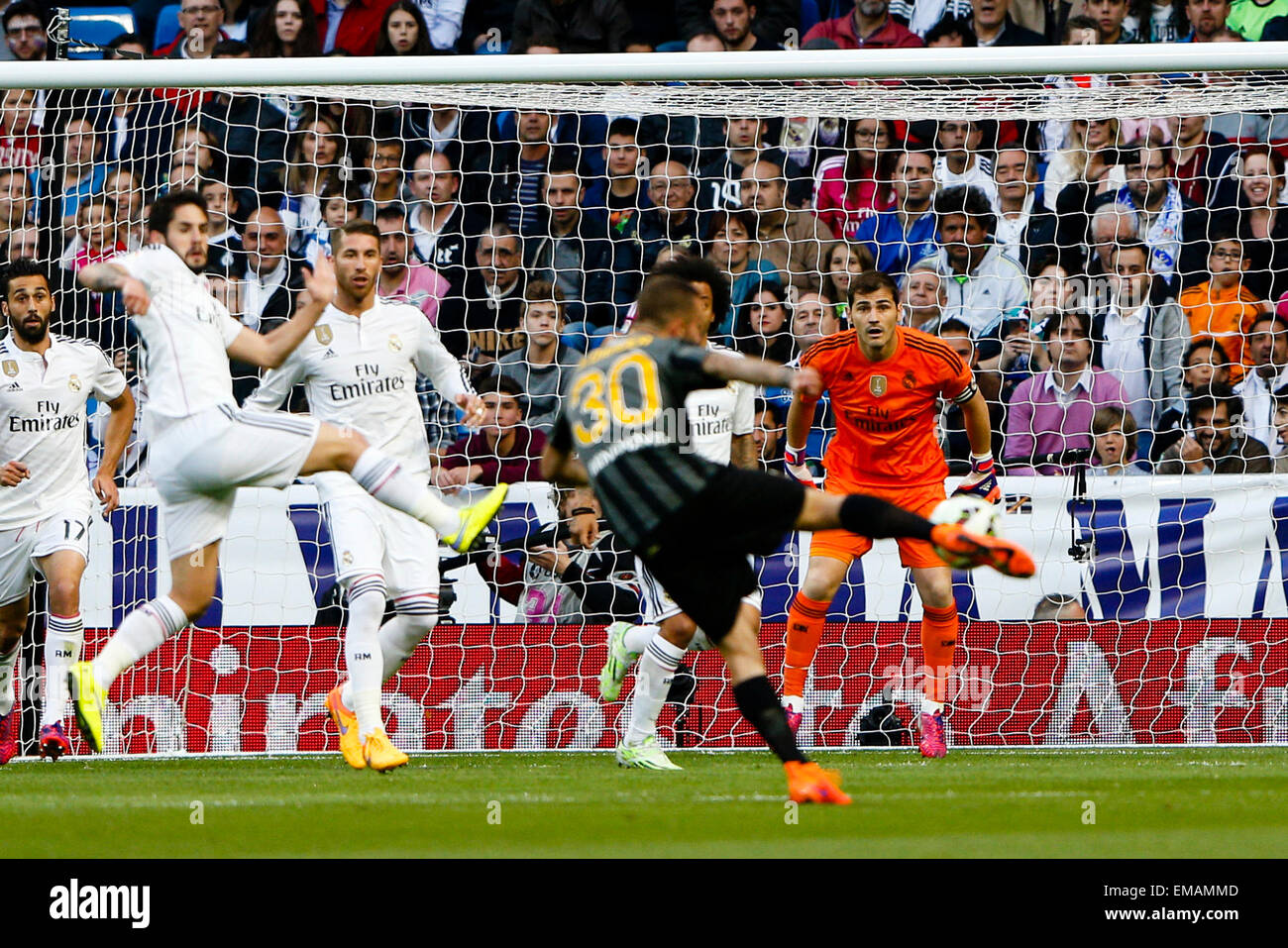 Madrid, Spain. 18th April, 2015. La Liga football. Real Madrid versus Malaga. Iker Casillas Fernandez Goalkeeper of Real Madrid about to make the save Credit:  Action Plus Sports Images/Alamy Live News Stock Photo