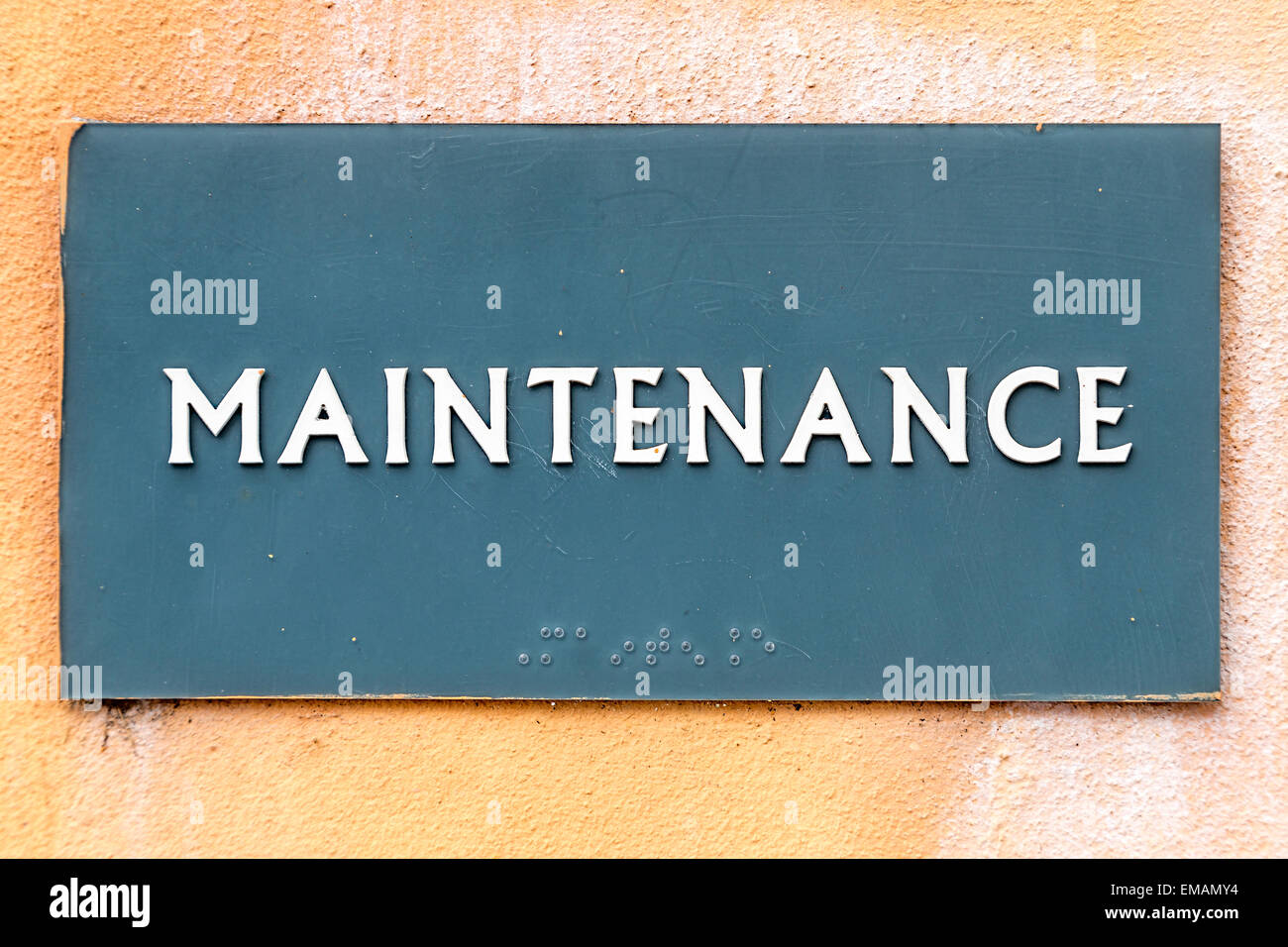 Maintenance Sign with the words Maintenance at a wall Stock Photo