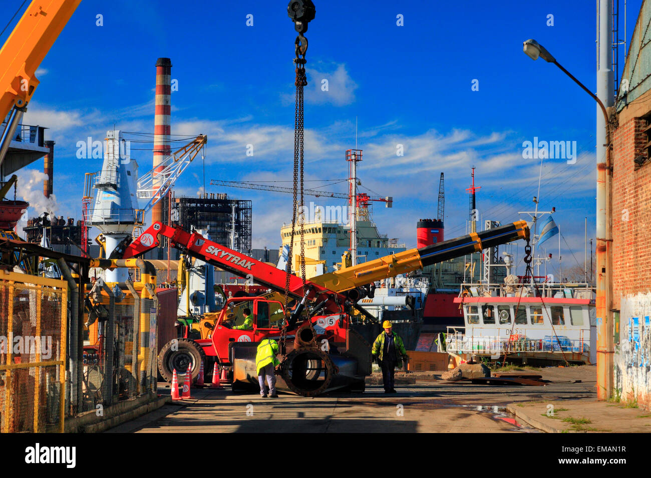 Dredging ships,  beacons and various machinery and cranes at Demarchi Island Port, River Plate  Coast. Buenos Aires, Argentina Stock Photo